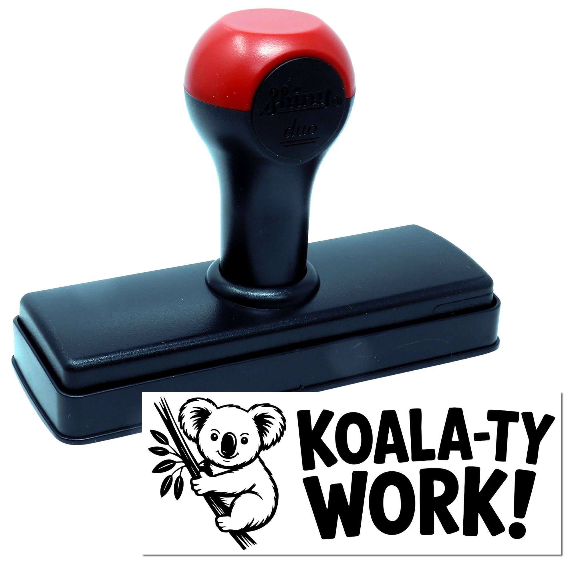 Black self-inking stamp and seal with red handle, koala logo, and bold KOALA-TY WORK text.