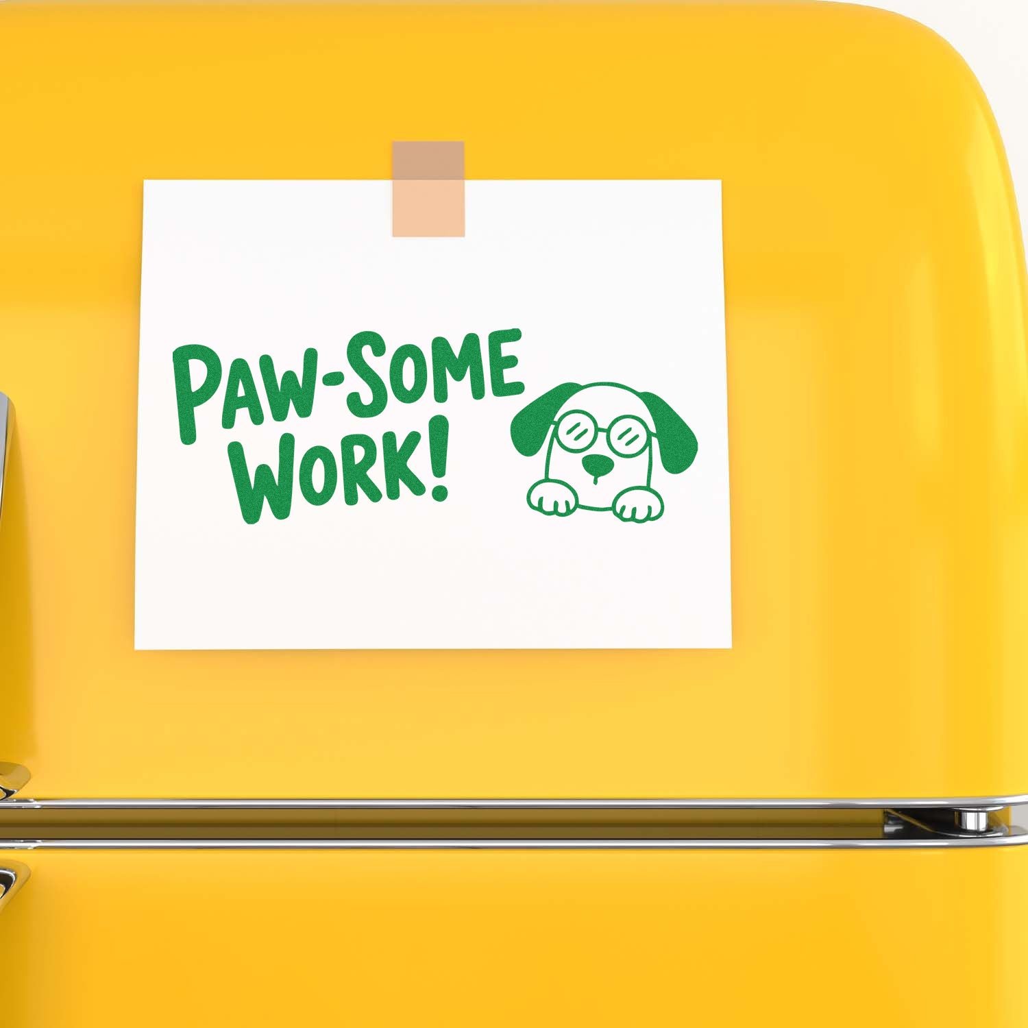 Green Paw-Some Work stamp and dog seal on white paper, taped to a bright yellow background.