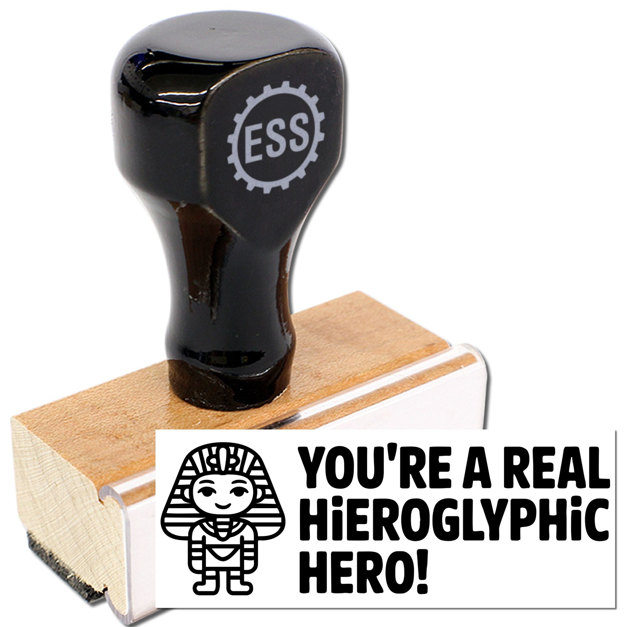Black custom rubber stamp and wooden seal with ESS logo, printing Youre a real hieroglyphic hero! in bold on white card.