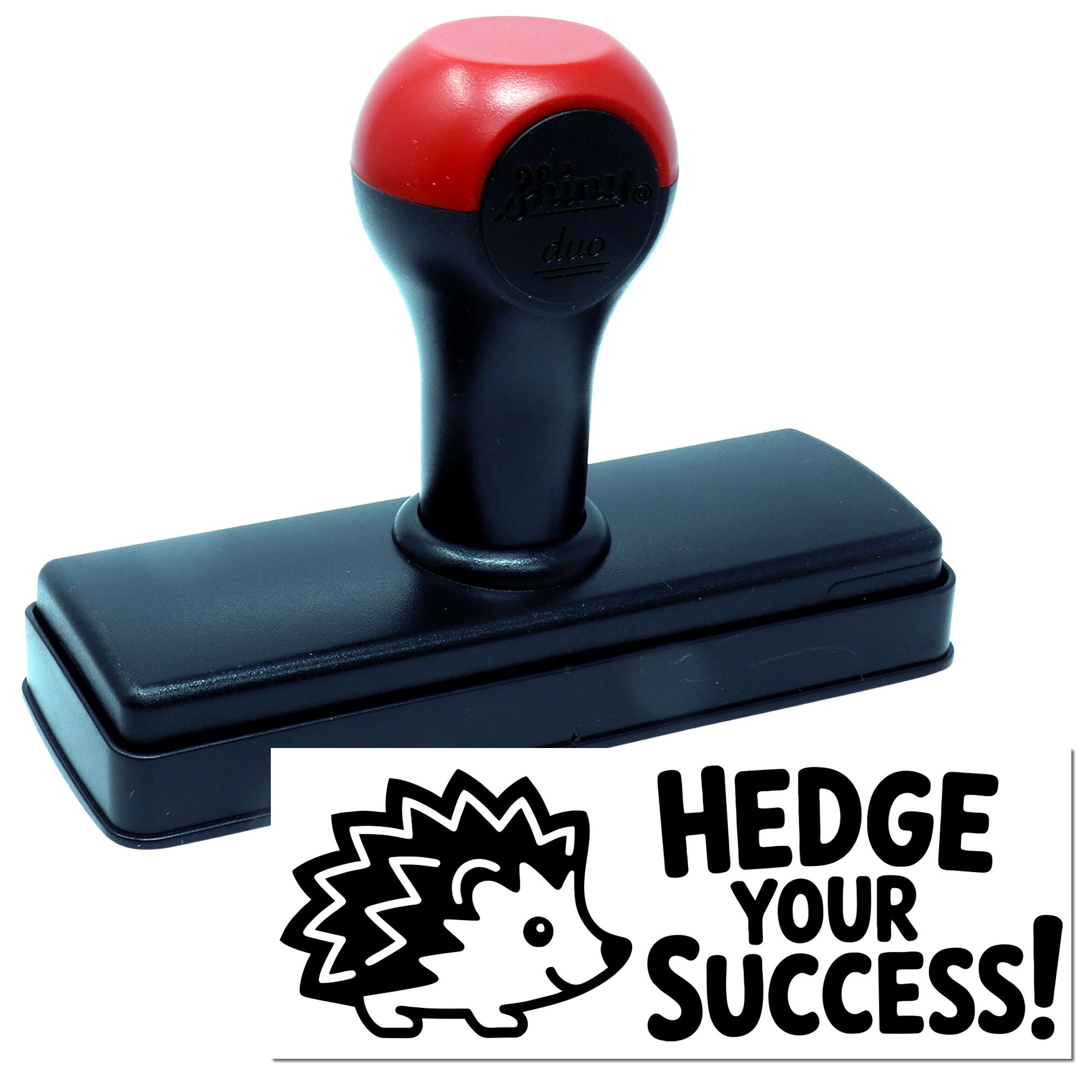 Black self-inking stamp with red top and Hedge Your Success hedgehog seal on white background.