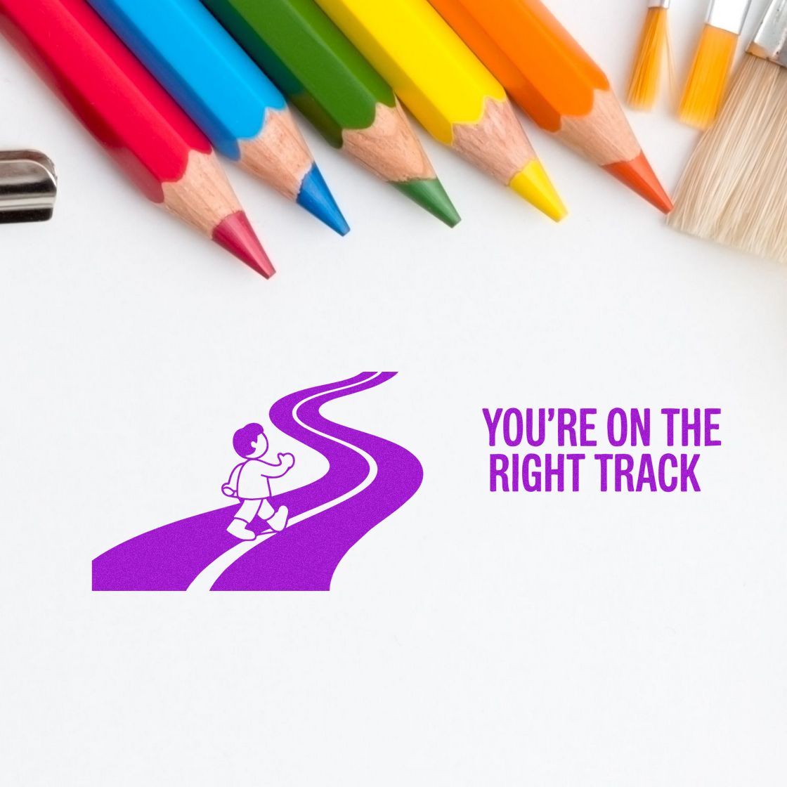 Purple stamp seal with walking figure and Youre on the right track text, framed by colorful pencils on white background