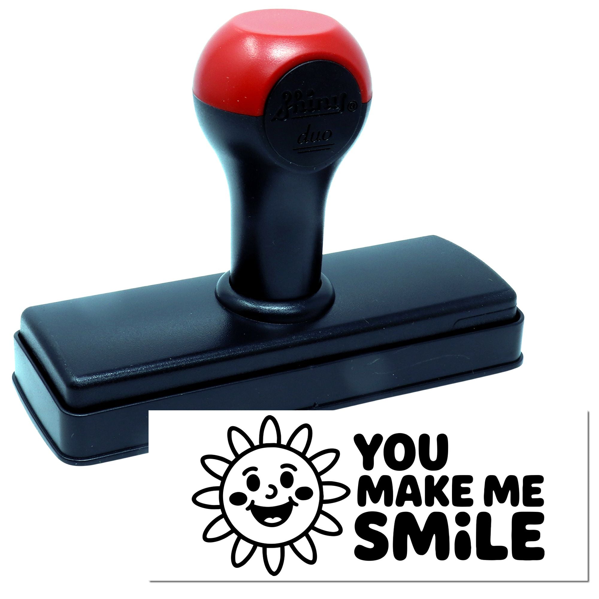 Red and black self-inking stamp with smiling sun seal and You Make Me Smile text