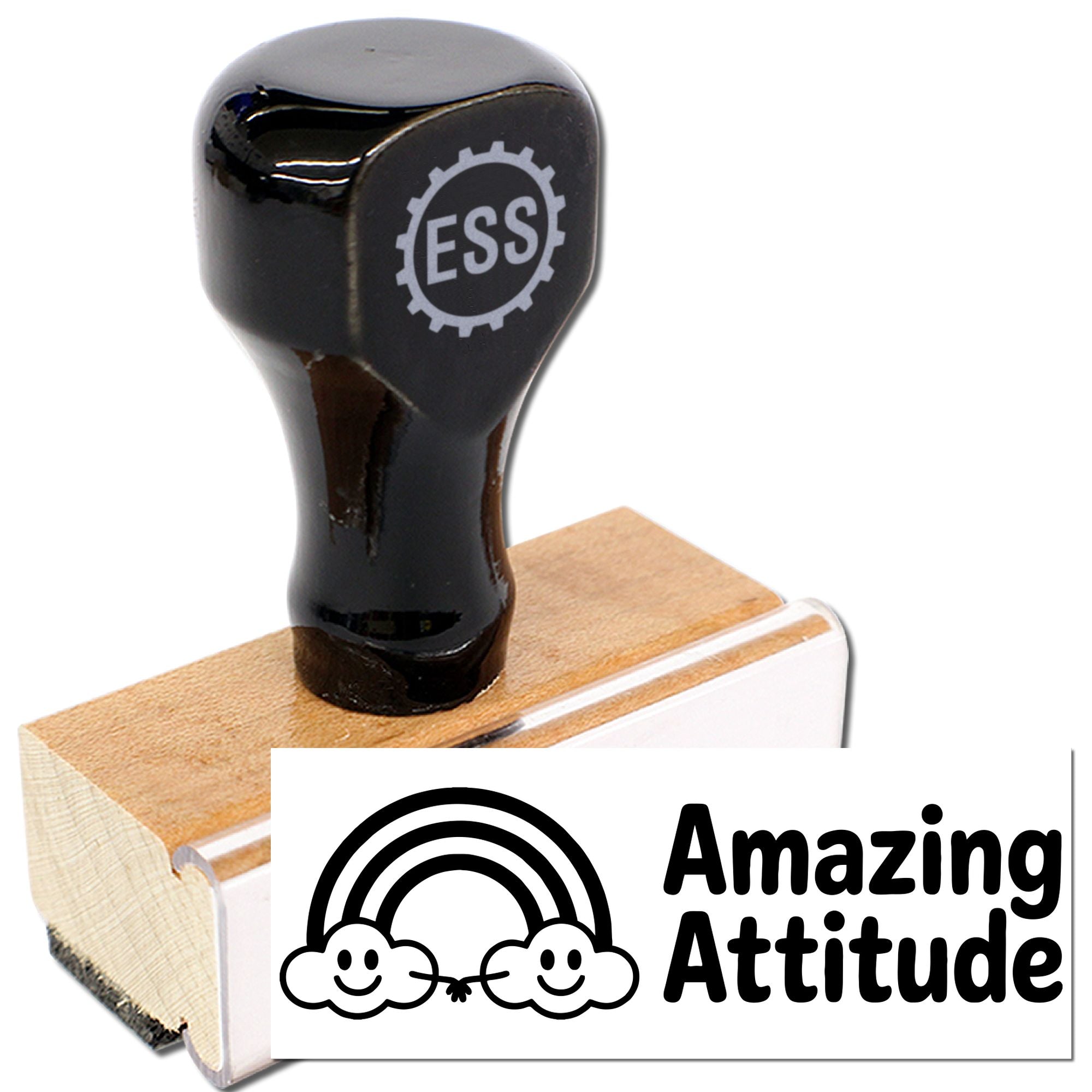 Black ESS rubber stamp on wood block with white seal card reading Amazing Attitude in bold black.
