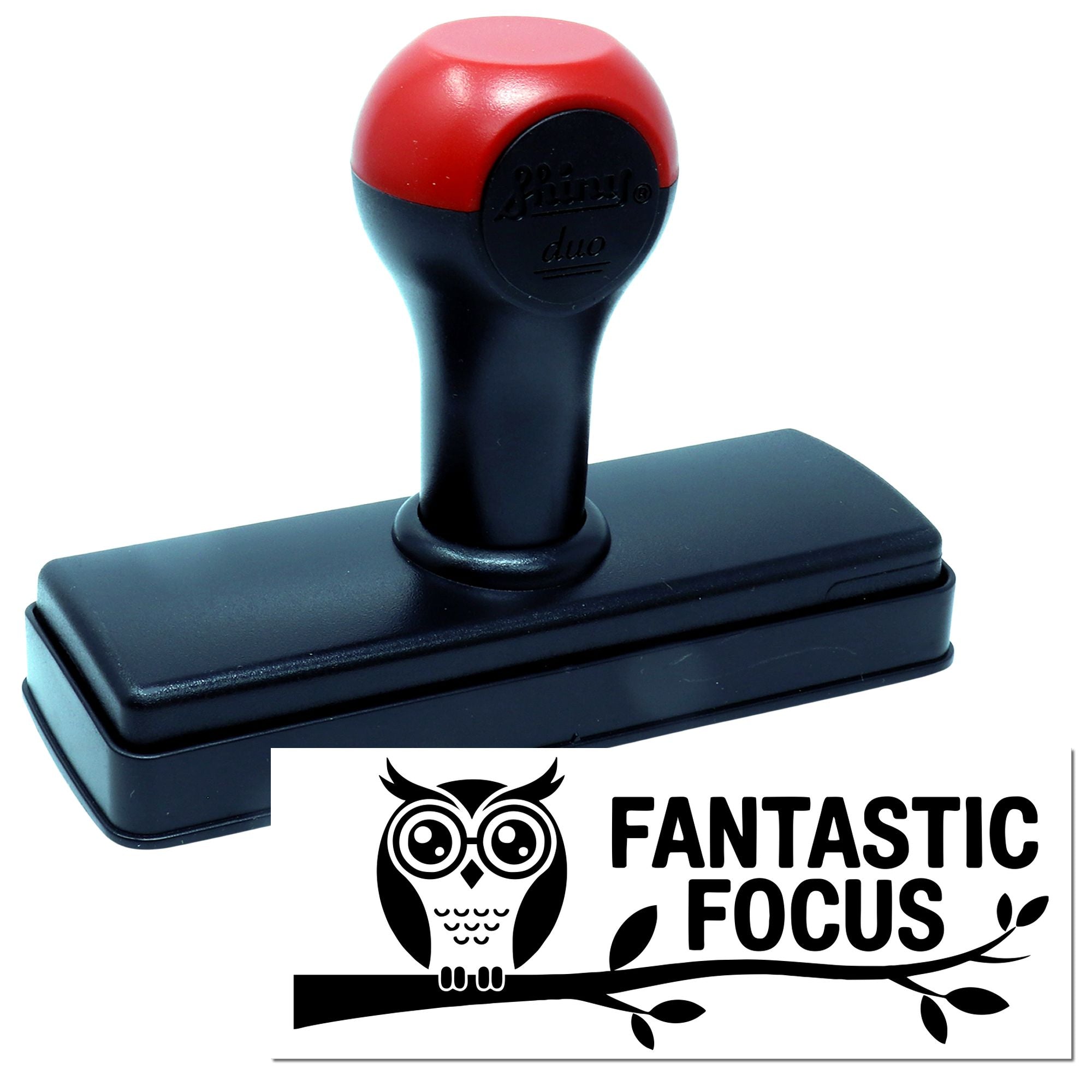 Red and black self-inking rubber stamp with owl logo and Fantastic Focus seal impression on white background.