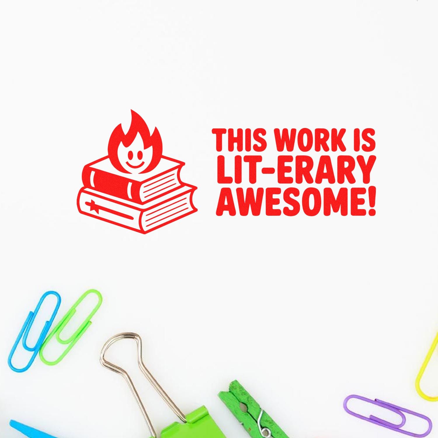 Red self-inking stamp and seal with stacked books and flame, saying This work is lit-erary awesome! on white with paper clips.