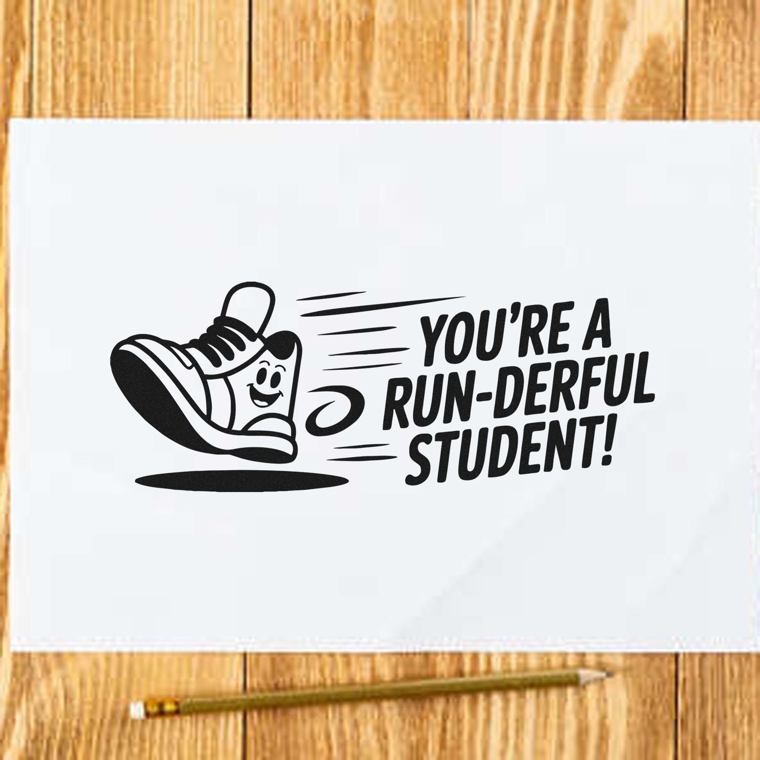 Black custom stamp and seal design on white paper with a running shoe and Youre a run-derful student! text.