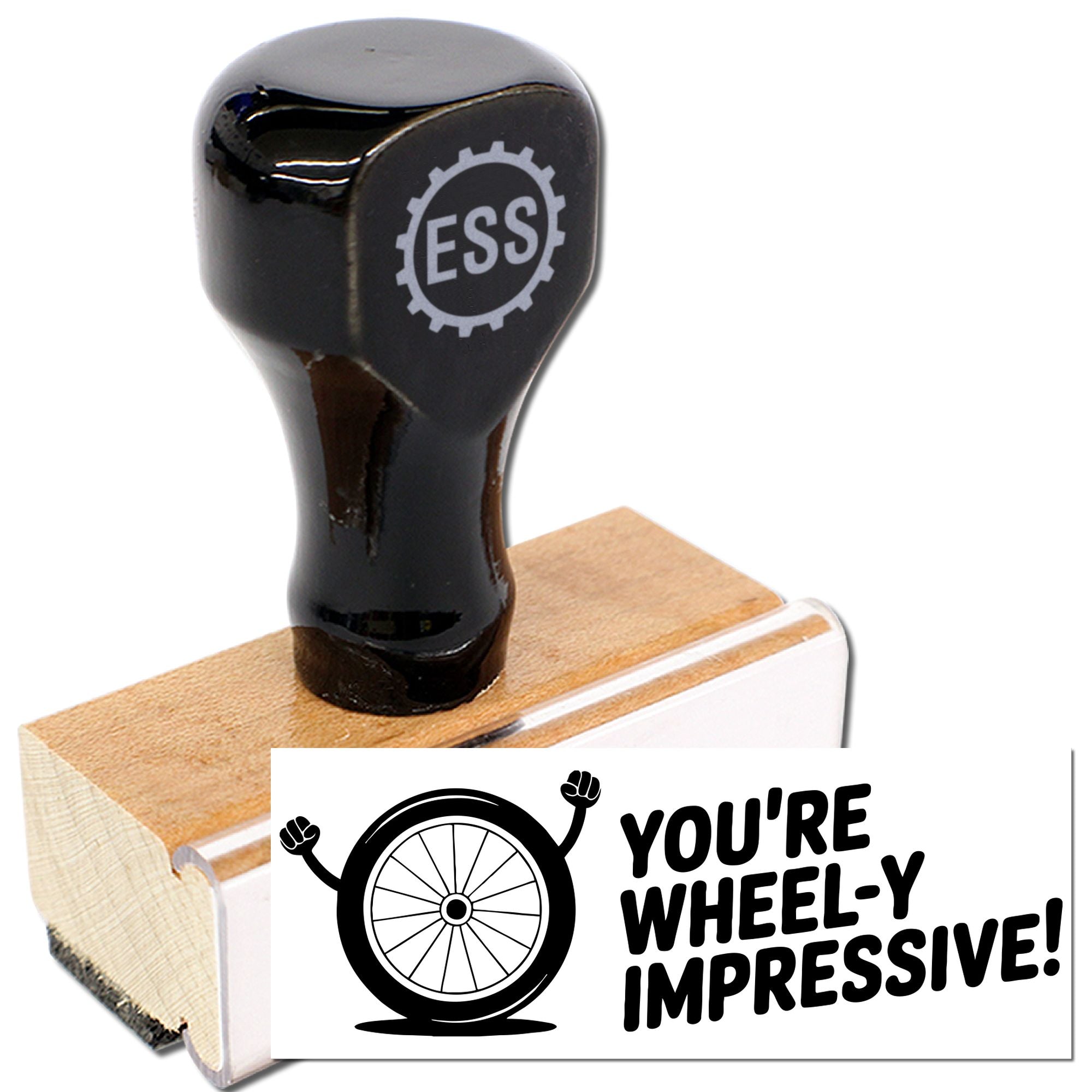 Black ESS rubber stamp on wooden base with white seal reading Youre wheel-y impressive! and a wheelchair icon