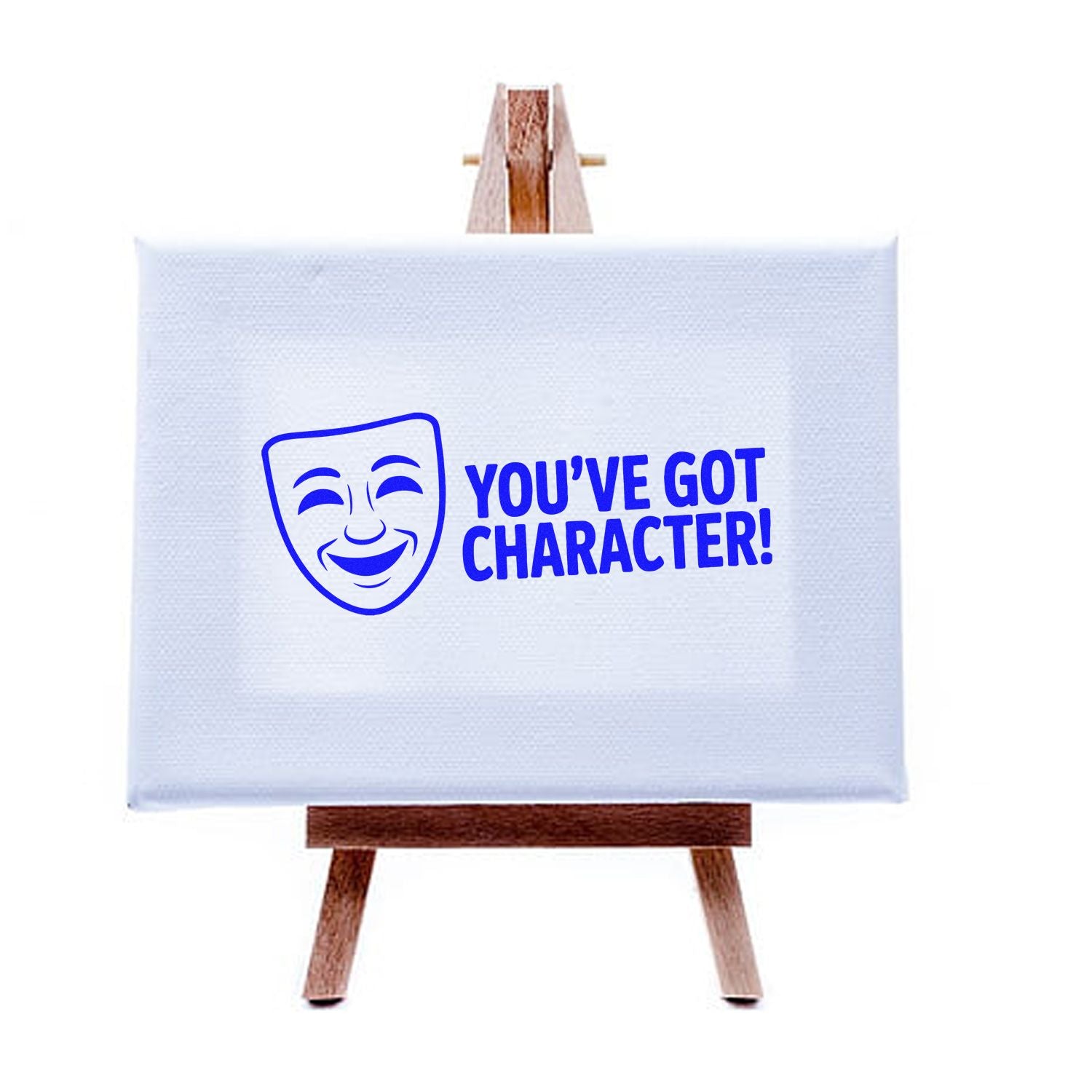 Blue custom stamp seal design with comedy mask and Youve got character! on white canvas easel