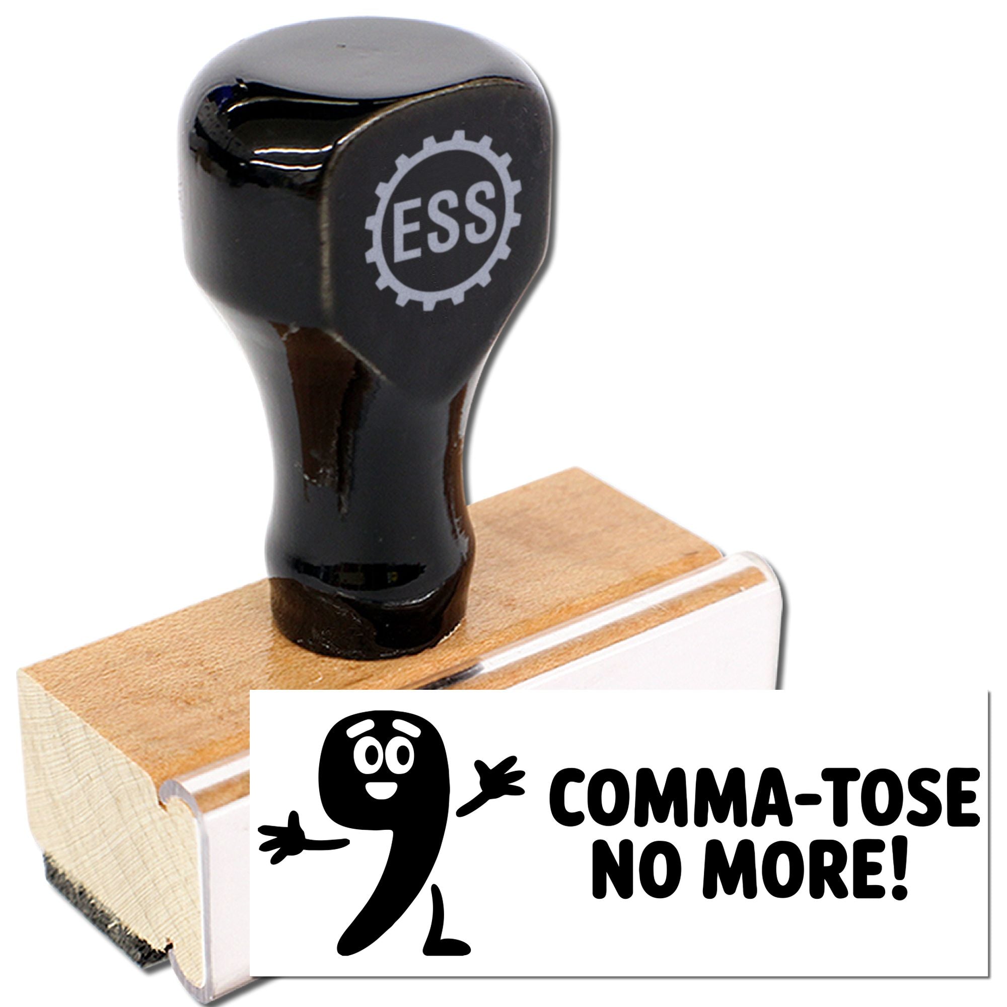 Black ESS rubber stamp and seal on wooden base, with white card reading Comma-tose No More! and cartoon 9.
