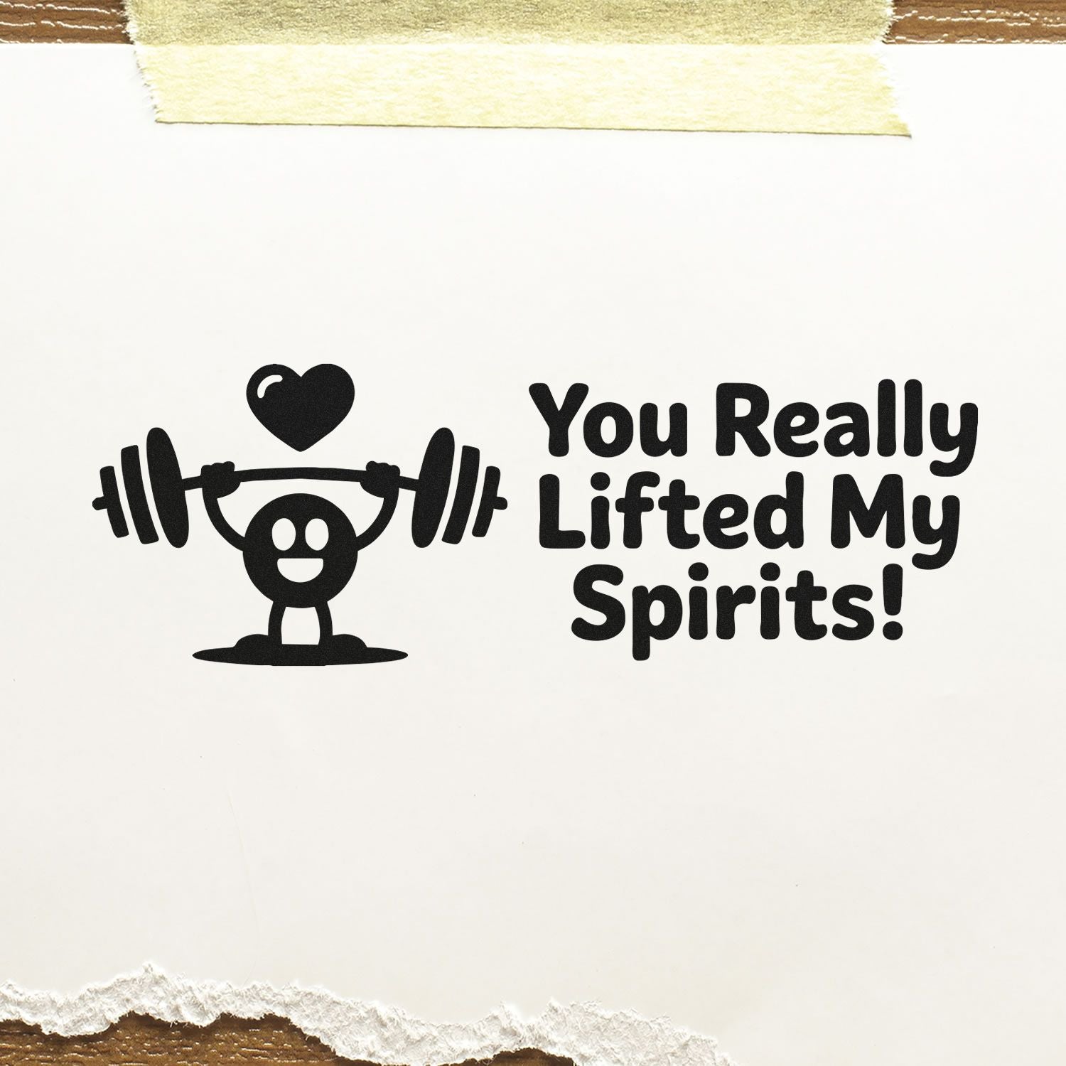 Black stamp and seal design of a weightlifter with heart and slogan You Really Lifted My Spirits!