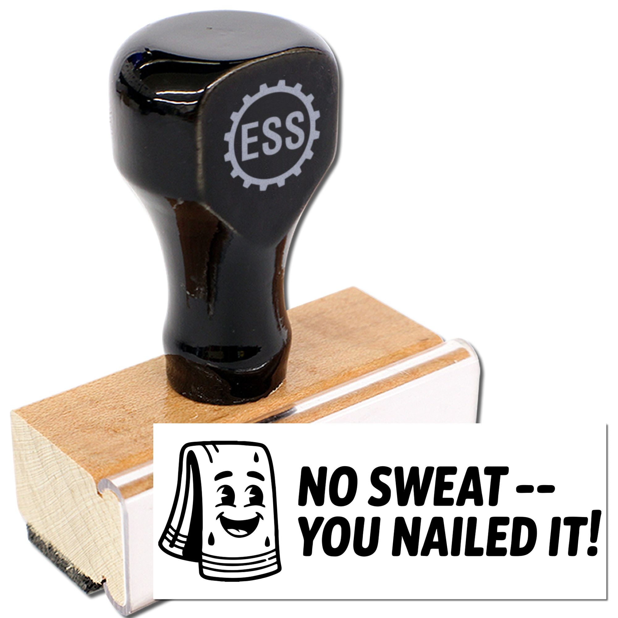 Black ESS rubber stamp and wooden seal base with white No SweatYou Nailed It! print.