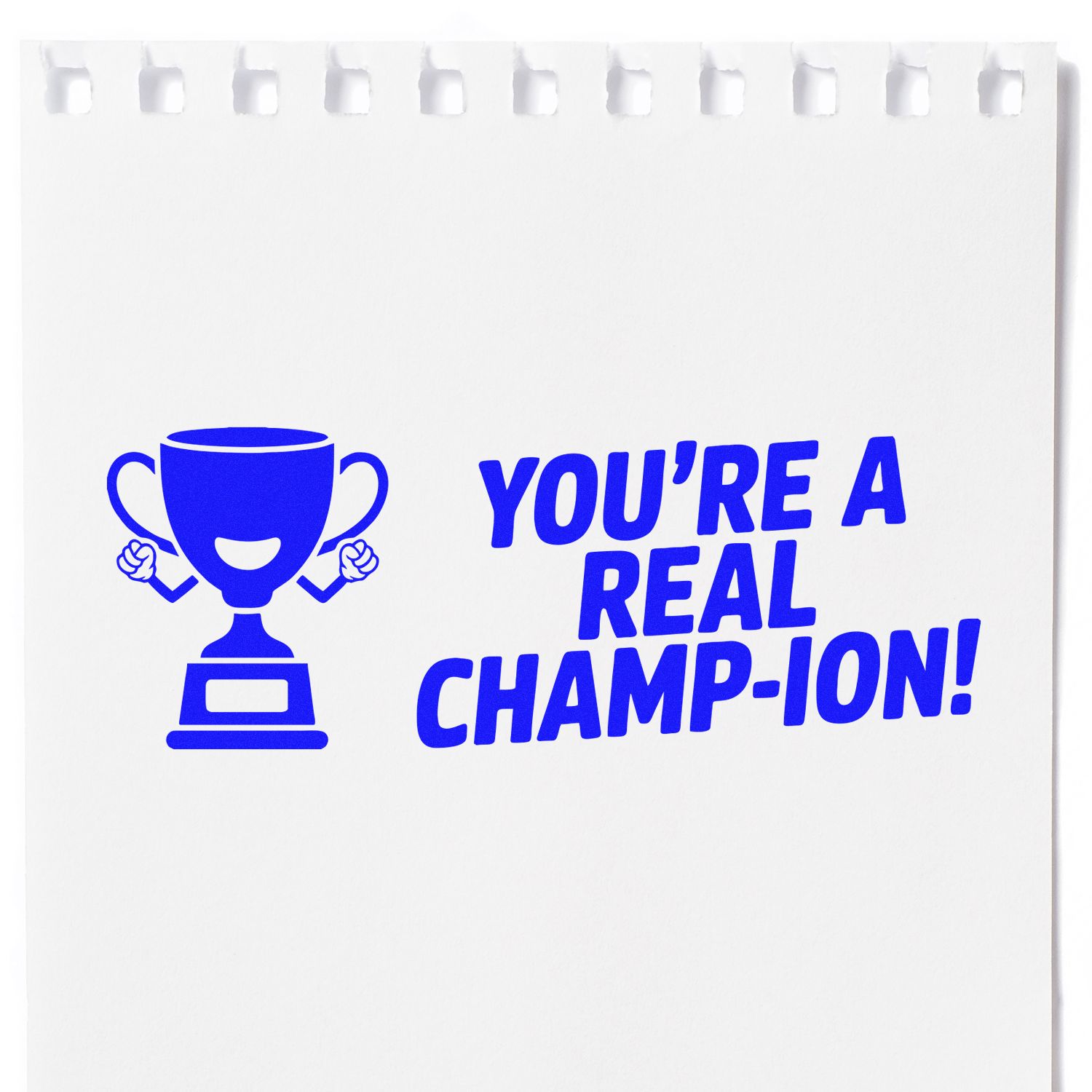 Blue stamp and seal with trophy icon and text Youre a Real Champion! on white paper.