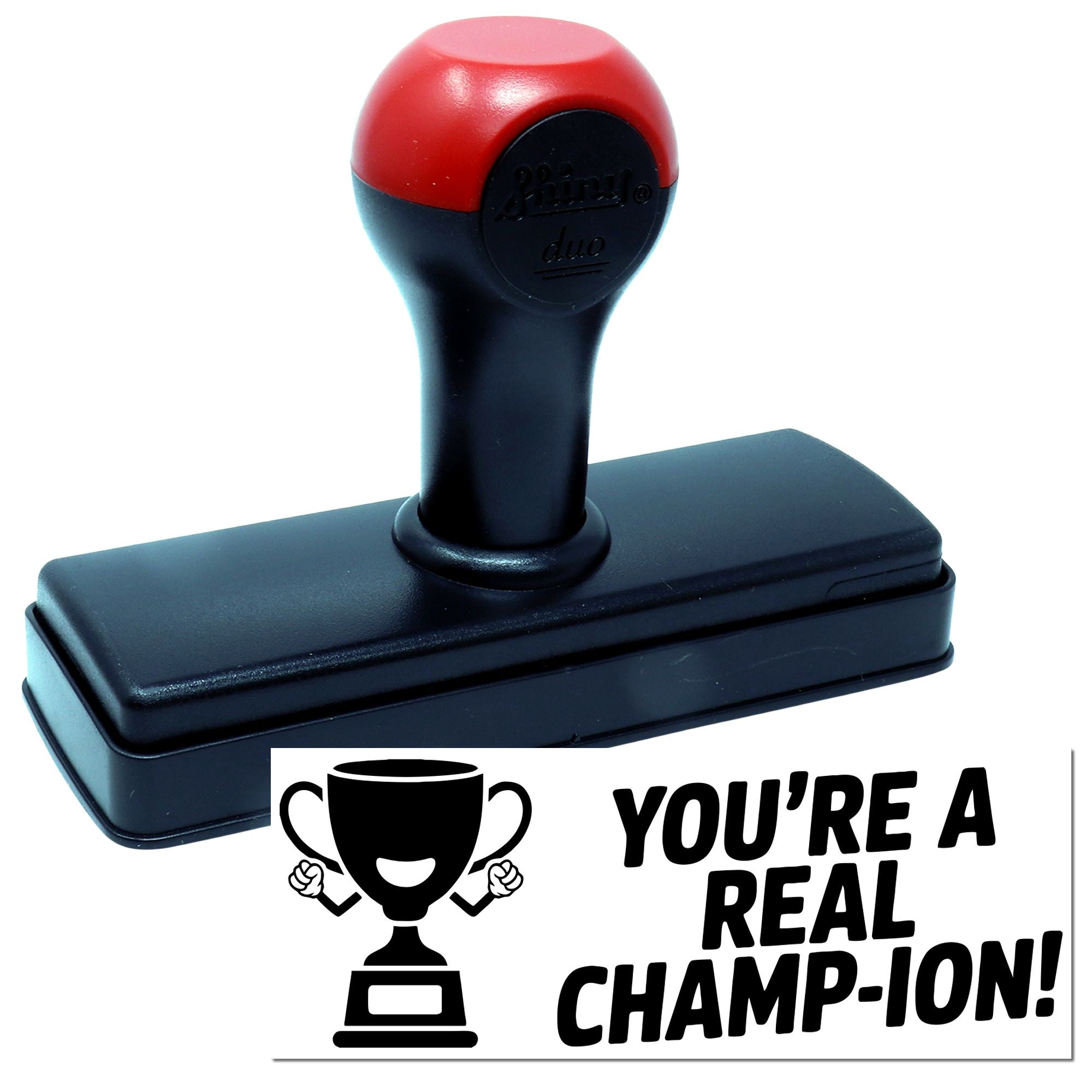 Red-and-black self-inking stamp and seal with trophy design and Youre a real champ-ion! imprint