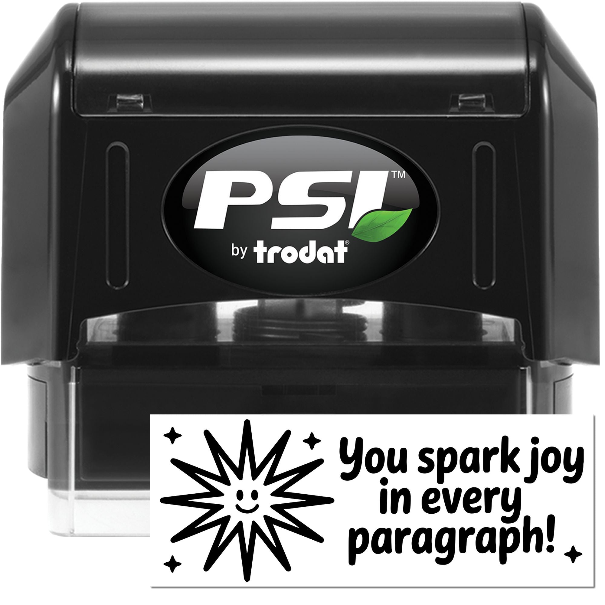 Black PSI by Trodat self-inking stamp with white You spark joy in every paragraph! seal and starburst design.