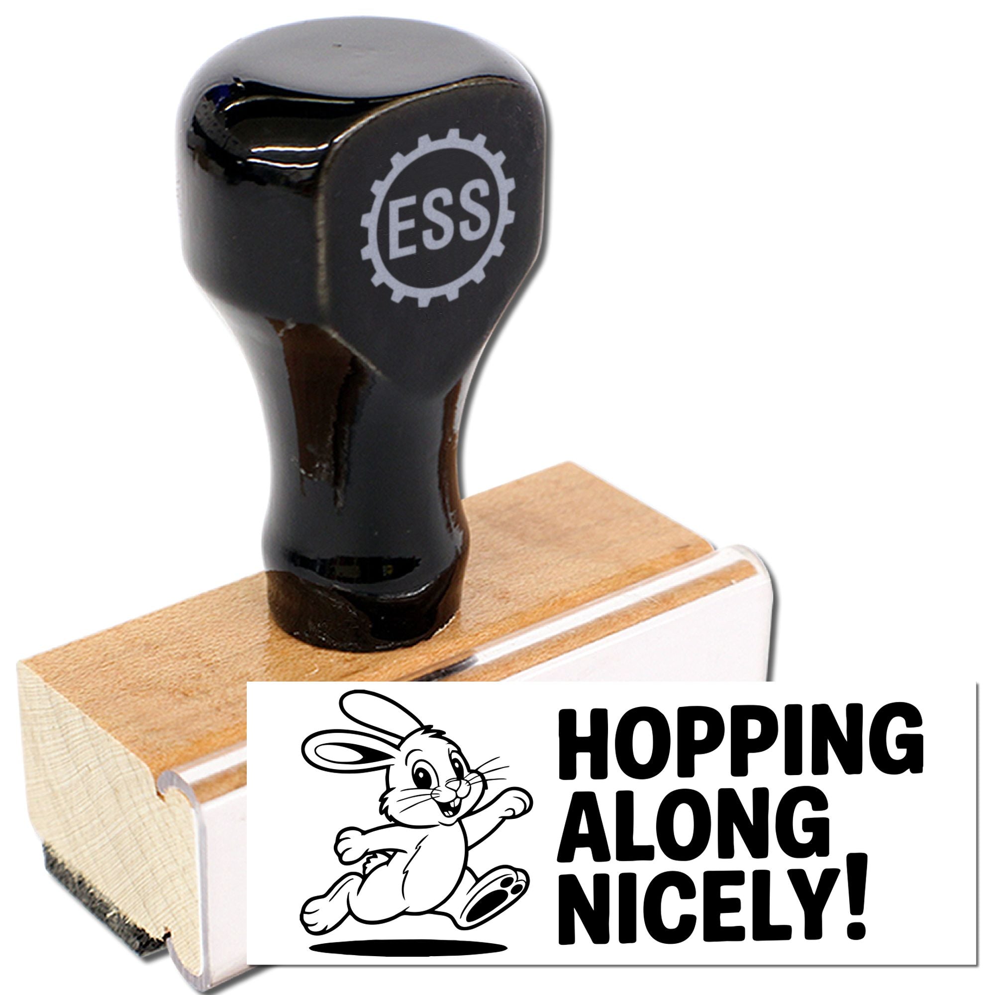 Black ESS rubber stamp and seal with wooden base, featuring bunny graphic and Hopping Along Nicely! text.