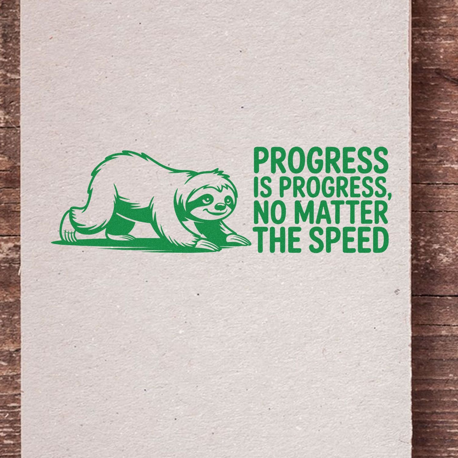 Green sloth stamp and seal design with Progress is progress, no matter the speed in green on off-white paper.