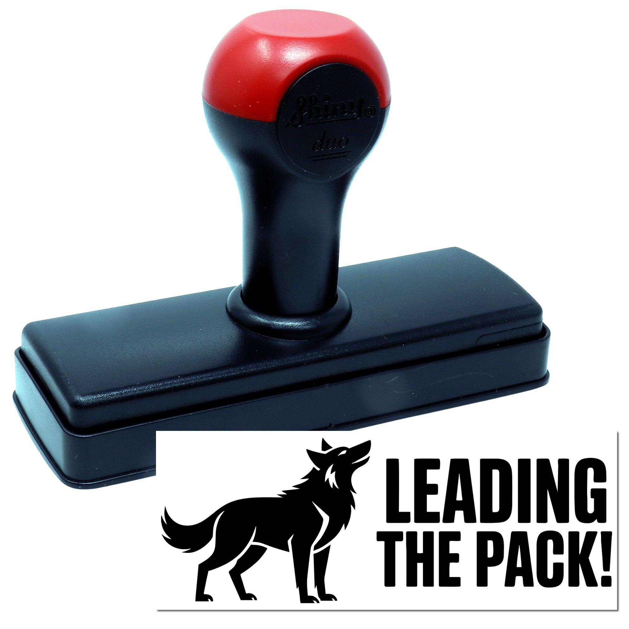 Red and black self-inking stamp with wolf logo and LEADING THE PACK! seal on white background.