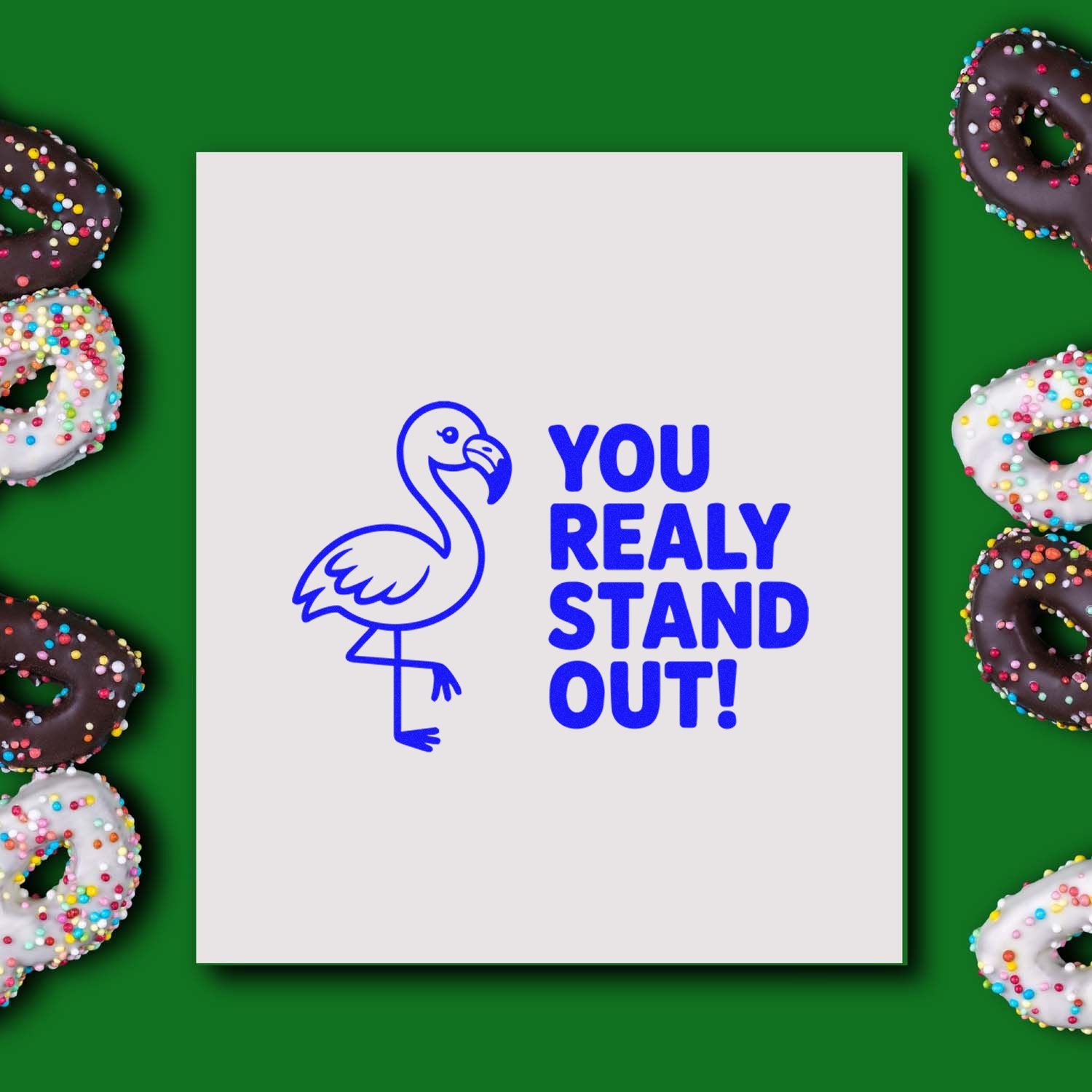 Blue flamingo custom stamp and seal reading YOU REALY STAND OUT! on a white square, with sprinkle donuts on green background.