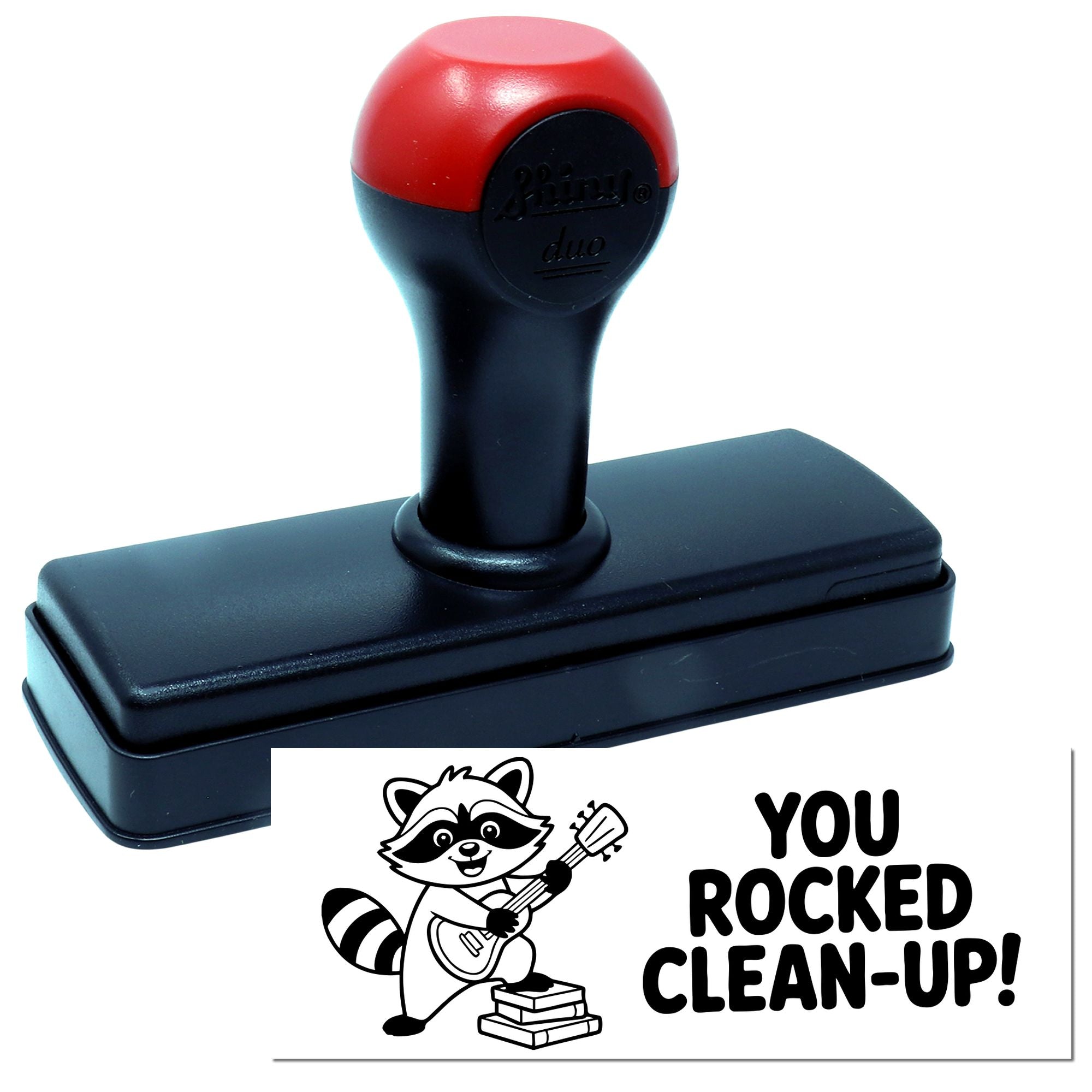 Red and black self-inking stamp and seal with raccoon guitarist and bold You Rocked Clean-Up! text.