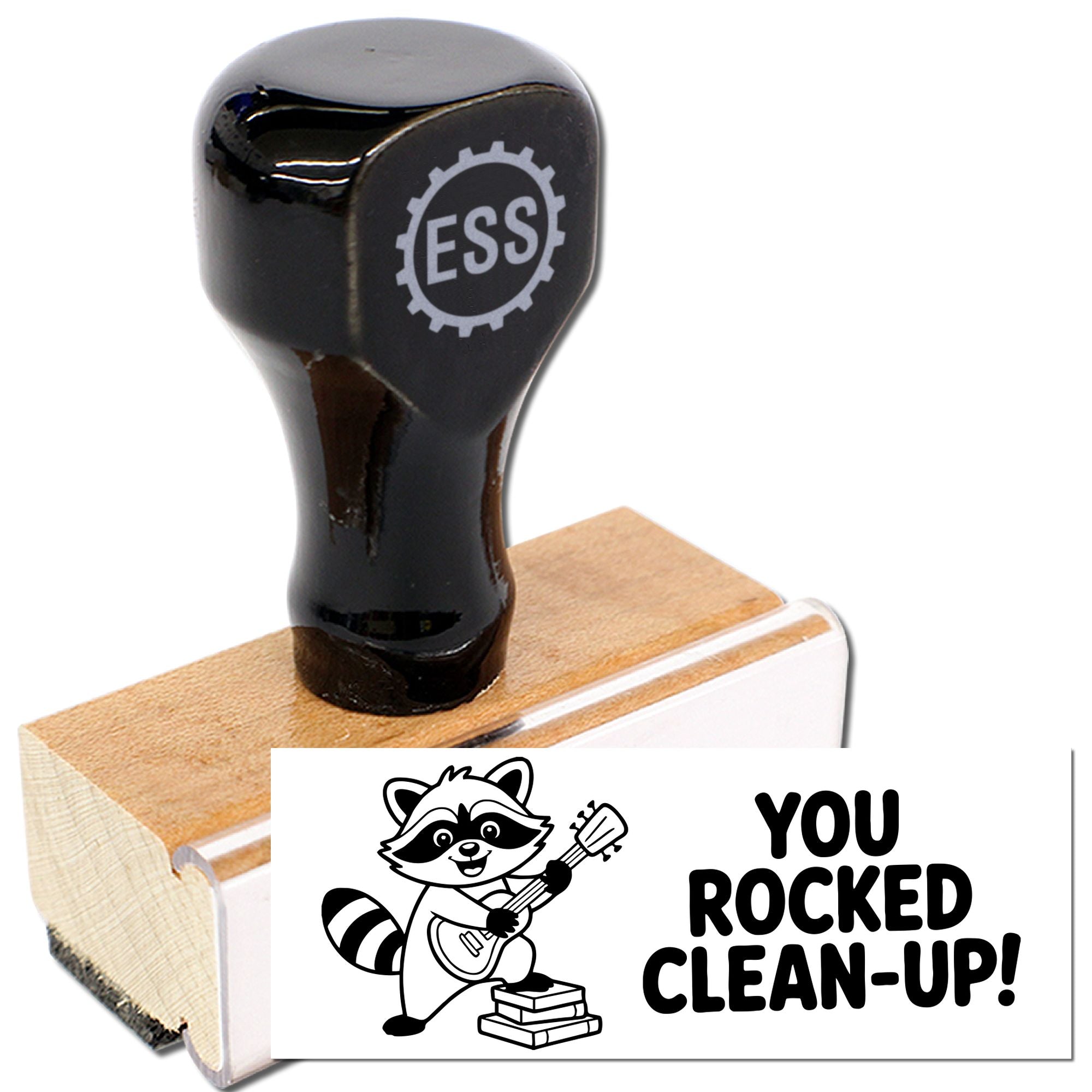 Black ESS stamp and seal on wooden block with white YOU ROCKED CLEAN-UP! raccoon imprint