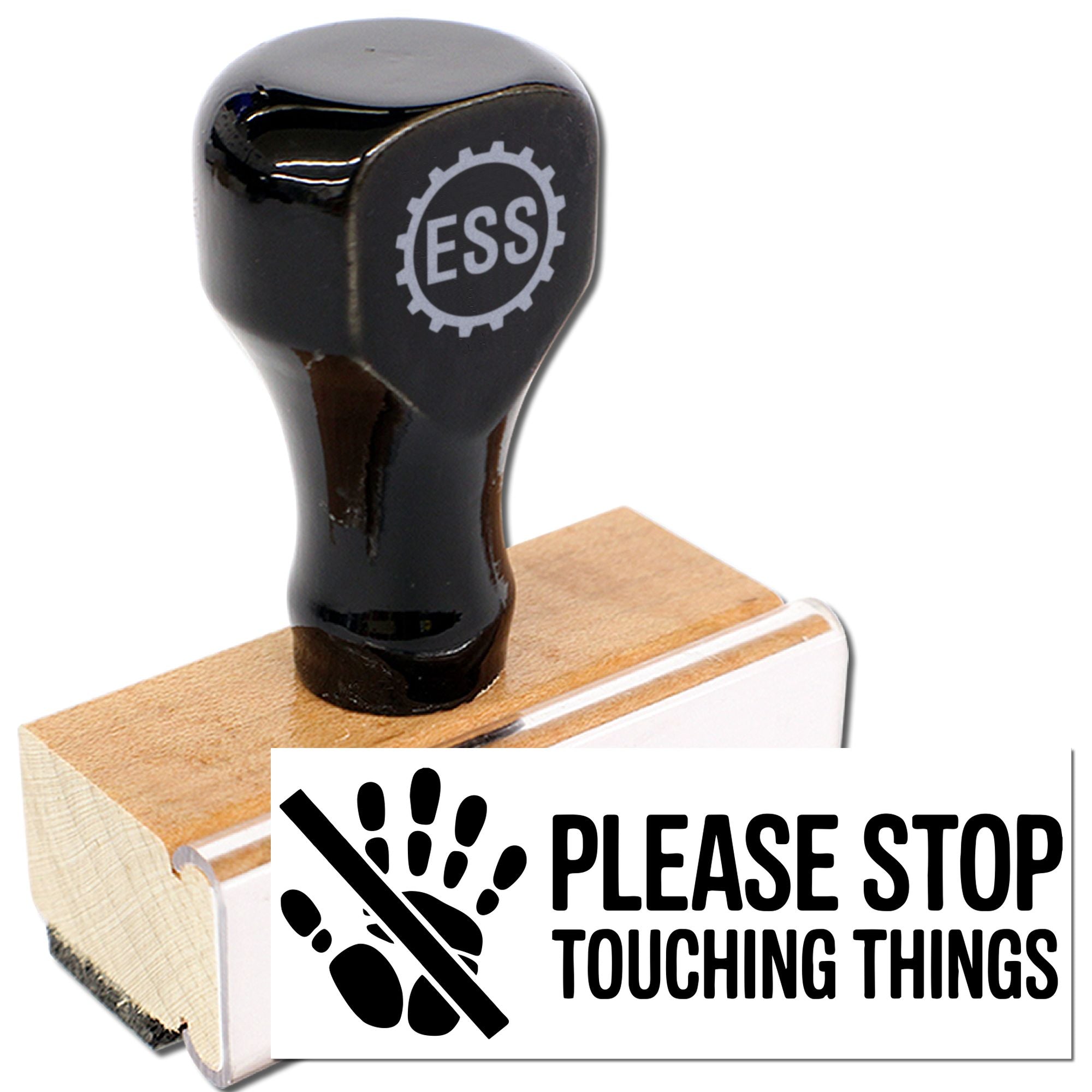 Black ESS rubber stamp on wooden base with white seal reading Please Stop Touching Things and hand icon.