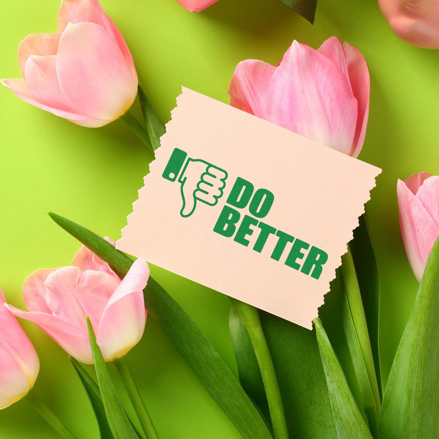 Beige stamp and seal card with green thumbs-down do better graphic among pink tulips on a bright lime background.