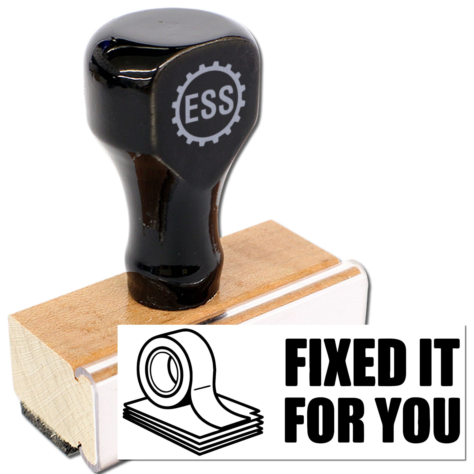 Black rubber stamp on natural wood block with ESS handle, featuring Fixed It For You text and tape icon