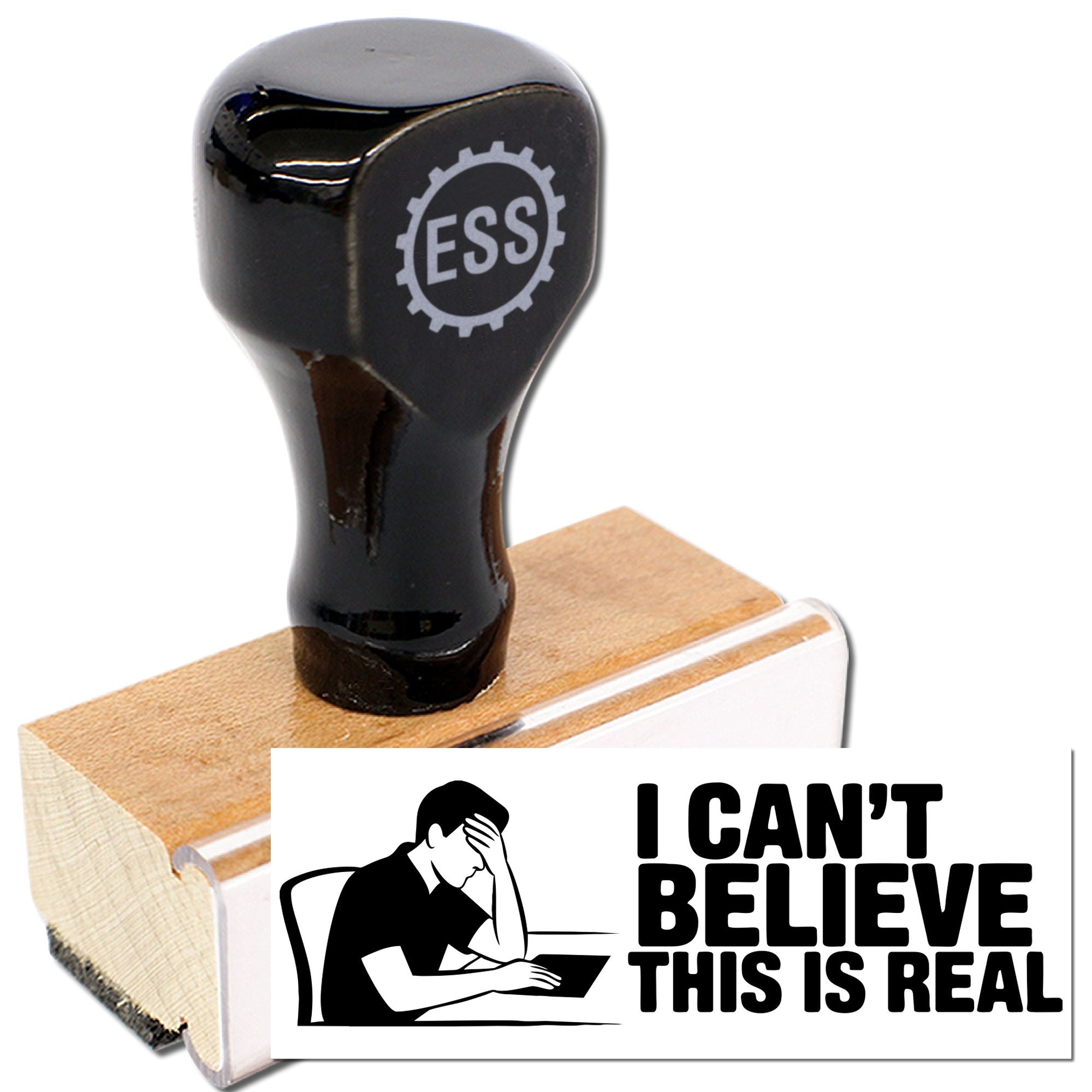 Black EBS rubber stamp on wooden base with seal reading I CANT BELIEVE THIS IS REAL and a person icon.