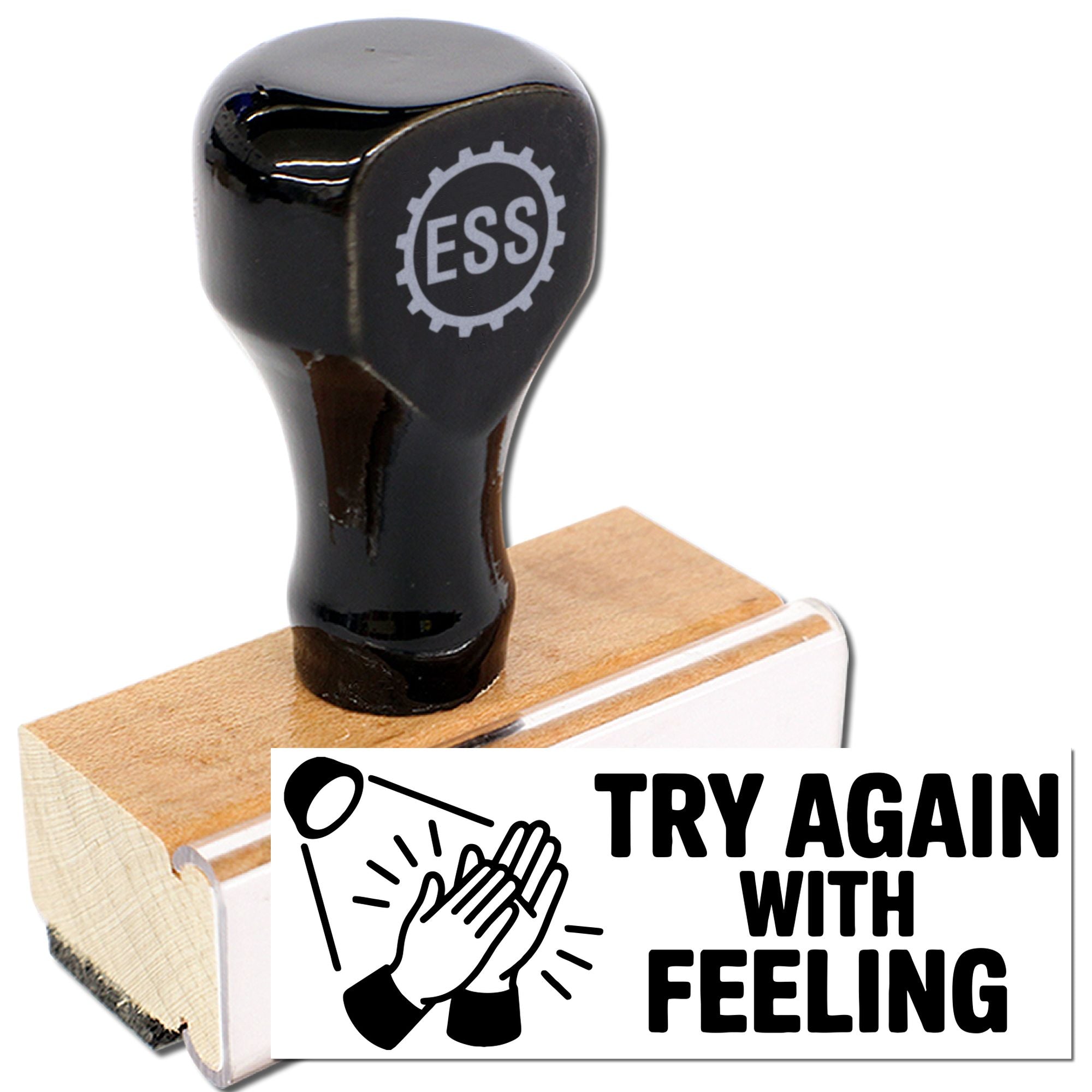 Black ESS rubber stamp and wooden seal block with white Try Again With Feeling text and clapping hands icon.
