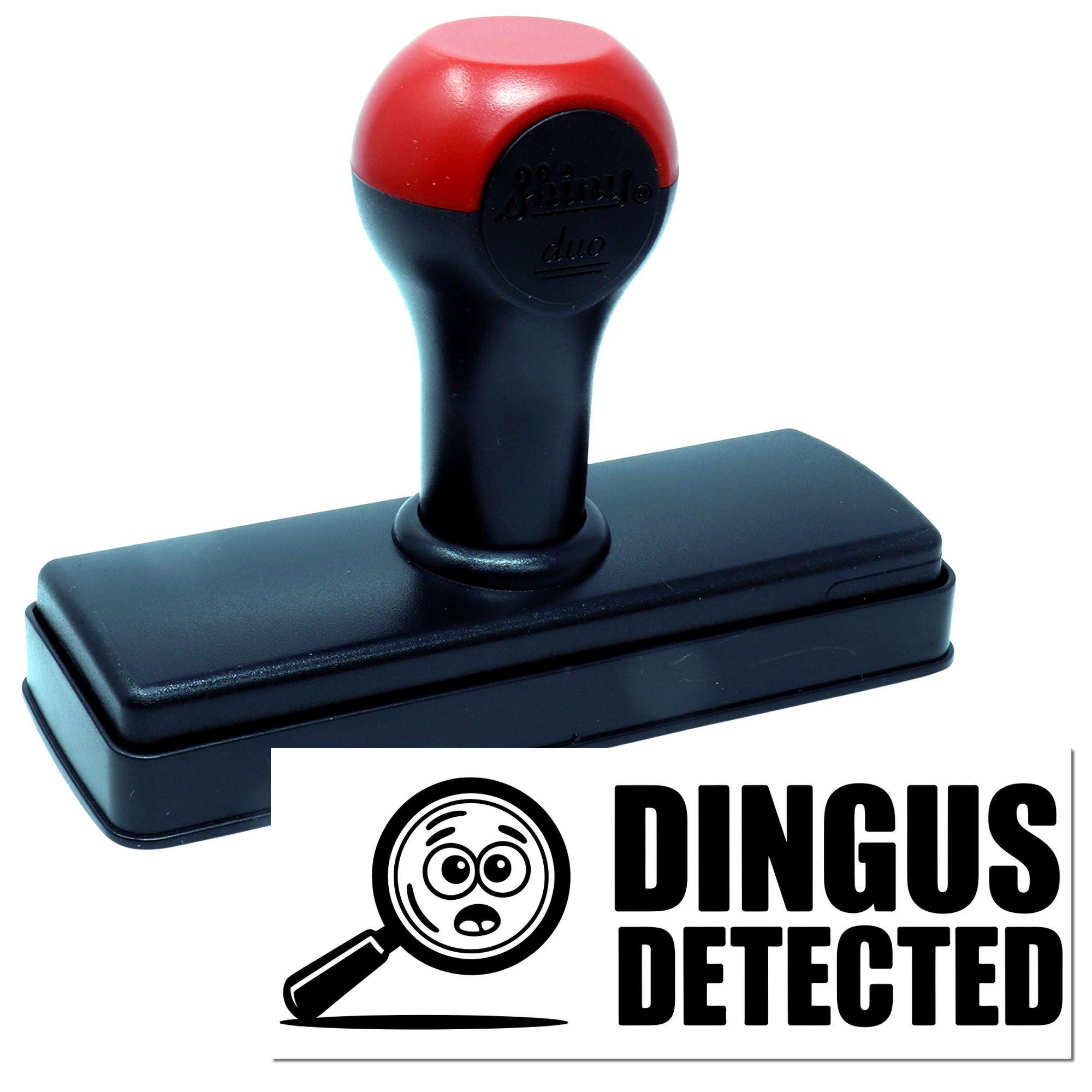 Red-and-black self-inking stamp and seal with rectangular base; Dingus Detected graphic and magnifying glass icon.
