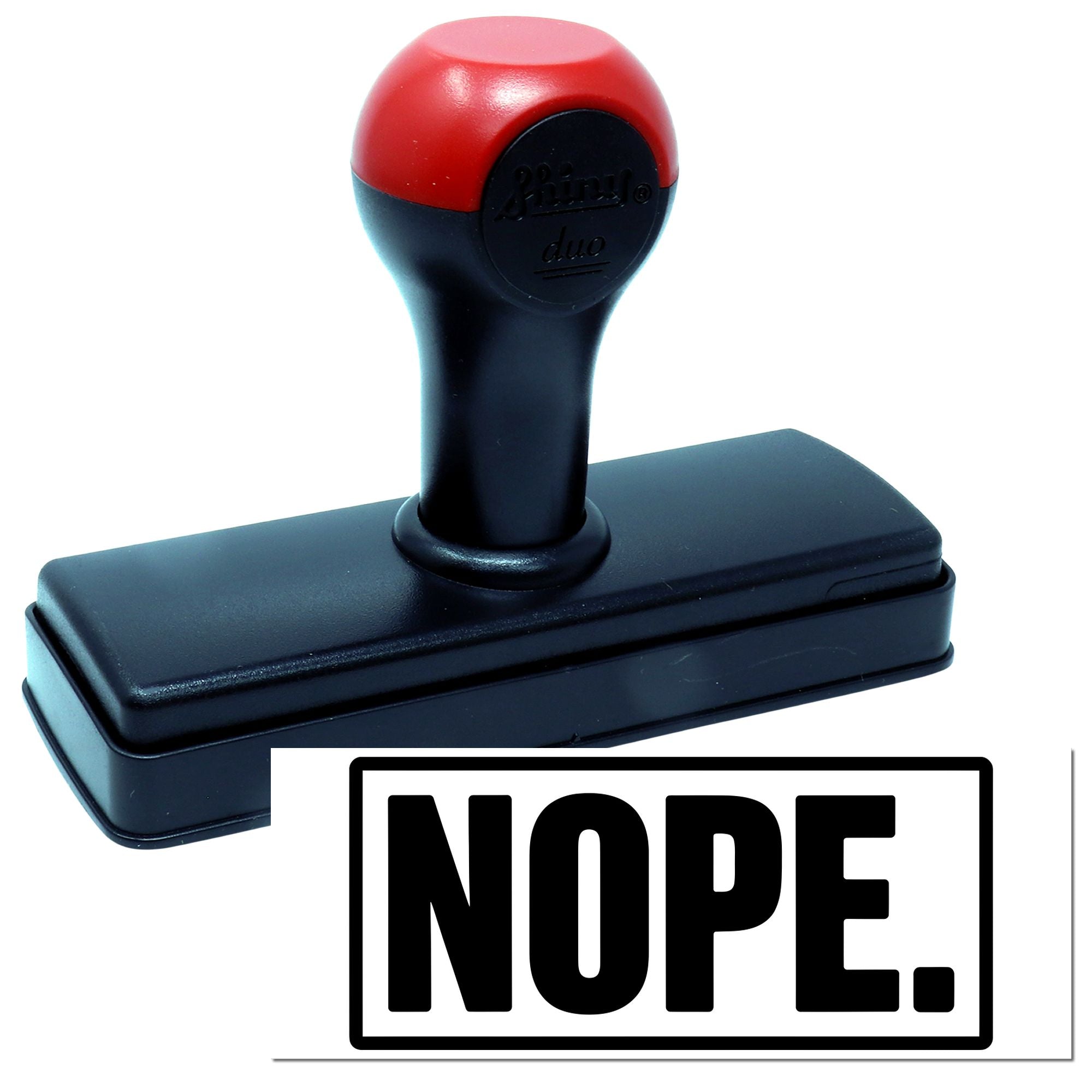 Red and black self-inking stamp with bold NOPE. imprint on white, featuring a rectangular black seal base.