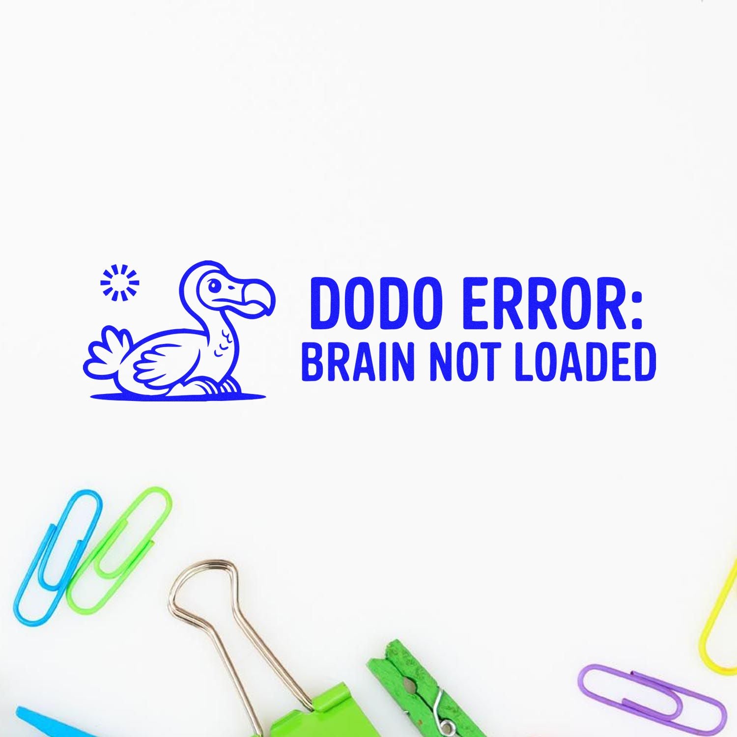Blue dodo stamp reading DODO ERROR: BRAIN NOT LOADED in blue, with colorful paper clips and binder clips on white background.