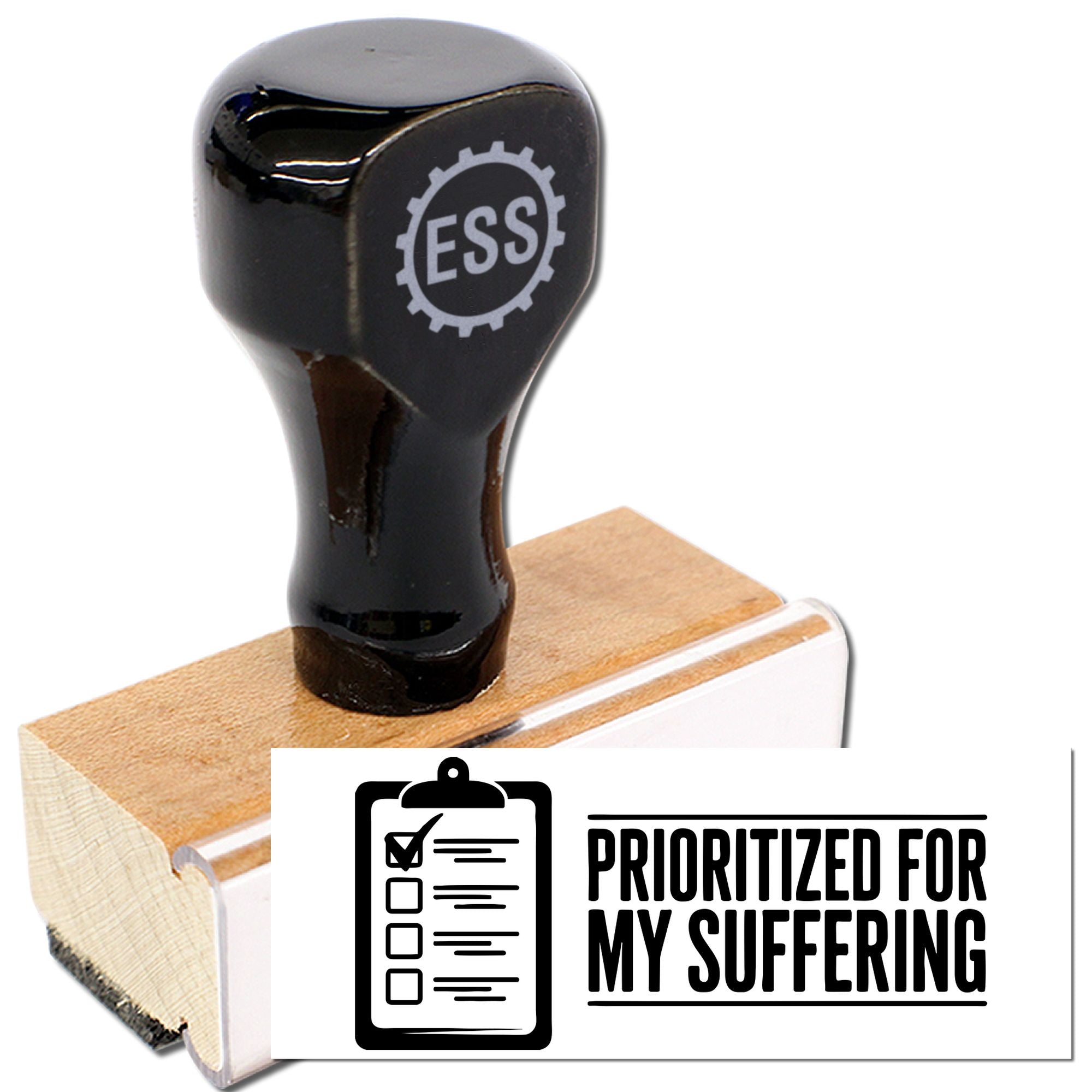 Black self-inking stamp on a wooden seal block, with white label and bold PRIORITIZED FOR MY SUFFERING text.