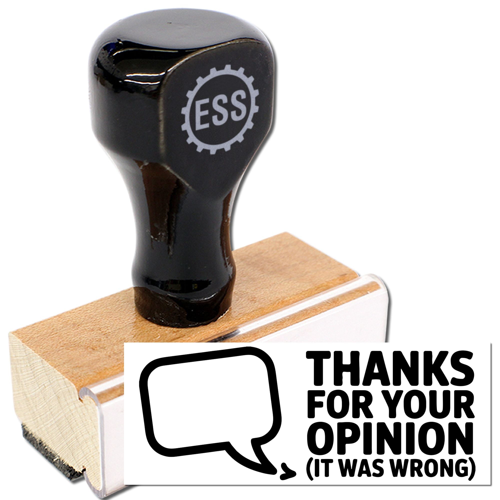 Black ESS rubber stamp on wooden base with white seal block reading Thanks for your opinion (it was wrong)