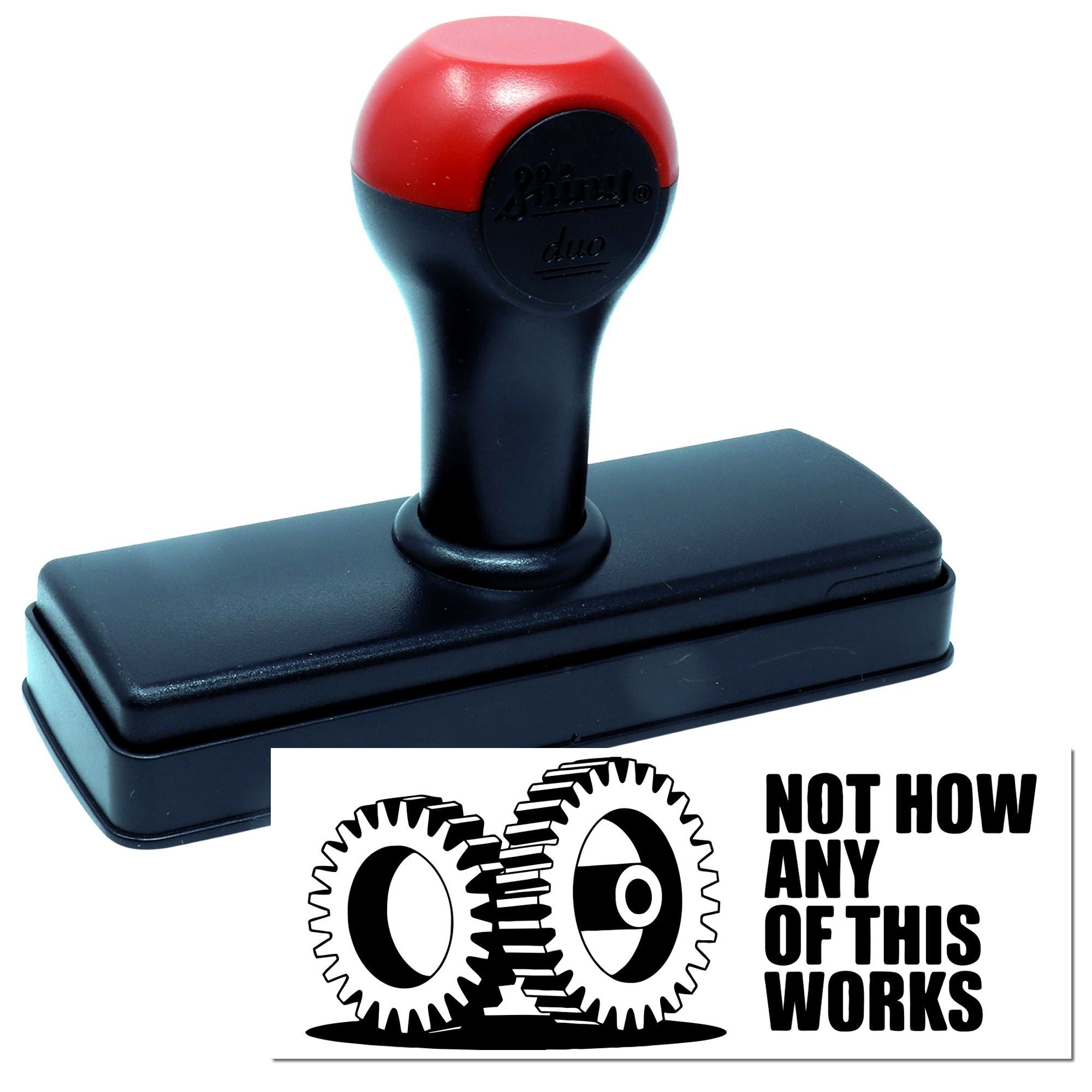 Red and black self-inking stamp with black base, featuring a Not Now Any of This Works gear design seal.
