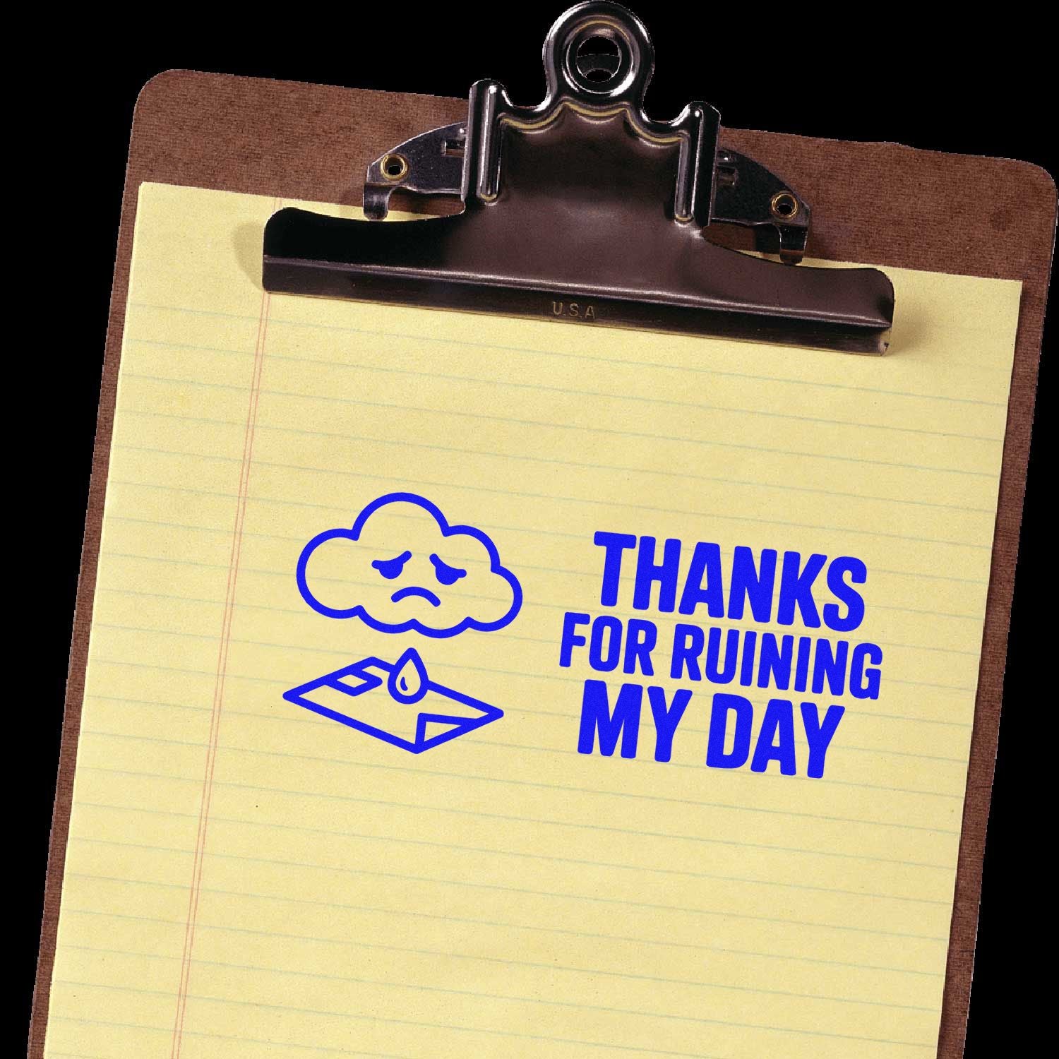 Clipboard stamp and seal with blue Thanks for ruining my day text, sad cloud, and melting envelope on yellow paper.