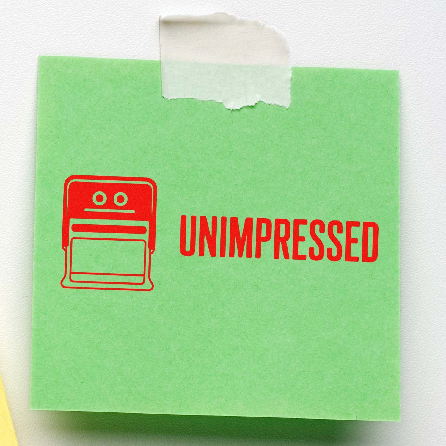 Green stamp-and-seal sheet with red UNIMPRESSED text, red seal icon, and white tape at the top.