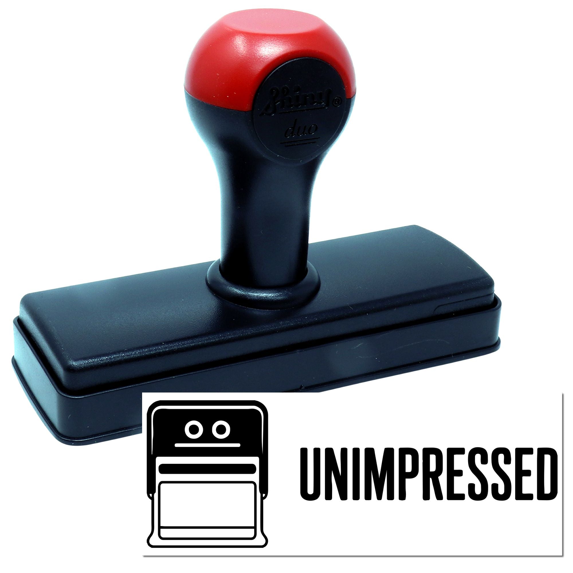 Black and red self-inking stamp and seal with rectangular base, labeled UNIMPRESSED on white background.