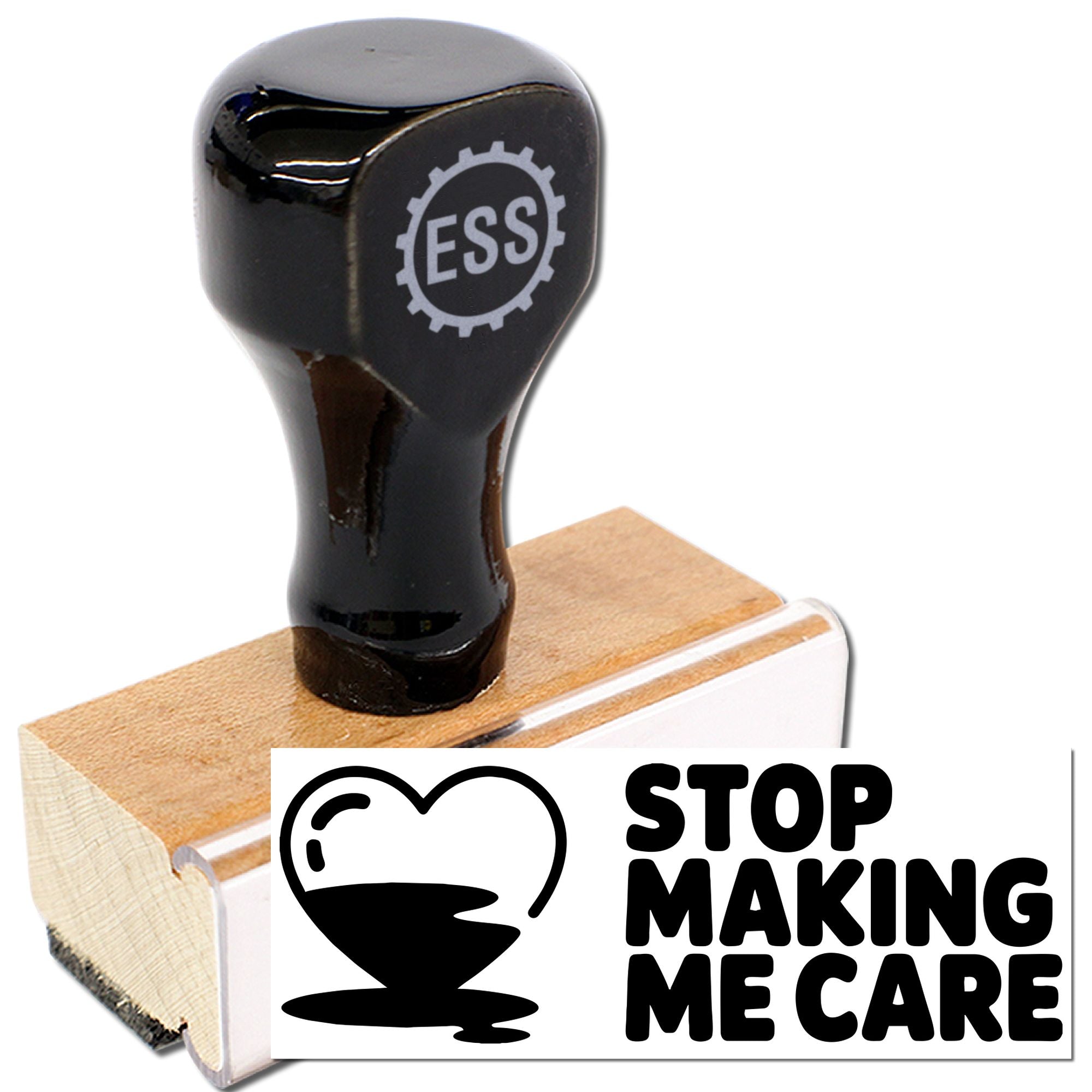 Black self-inking rubber stamp with wooden base, ESS logo, and bold STOP MAKING ME CARE seal graphic.