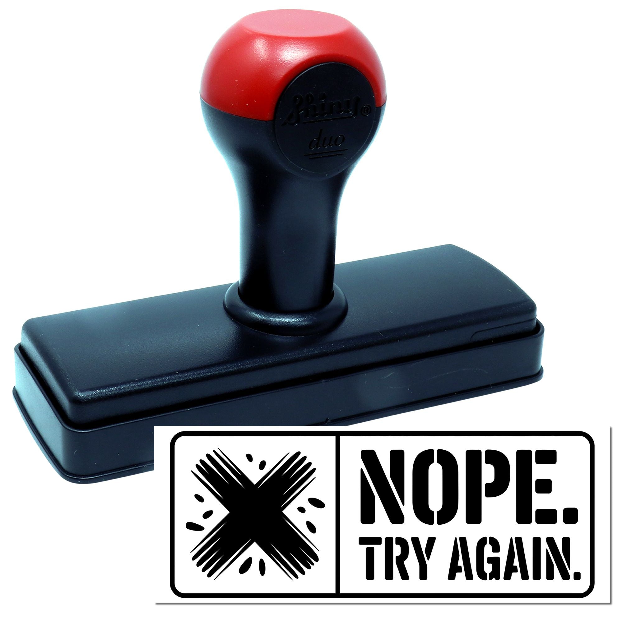 Black self-inking stamp with red handle and NOPE. TRY AGAIN. seal imprint with crossed mark