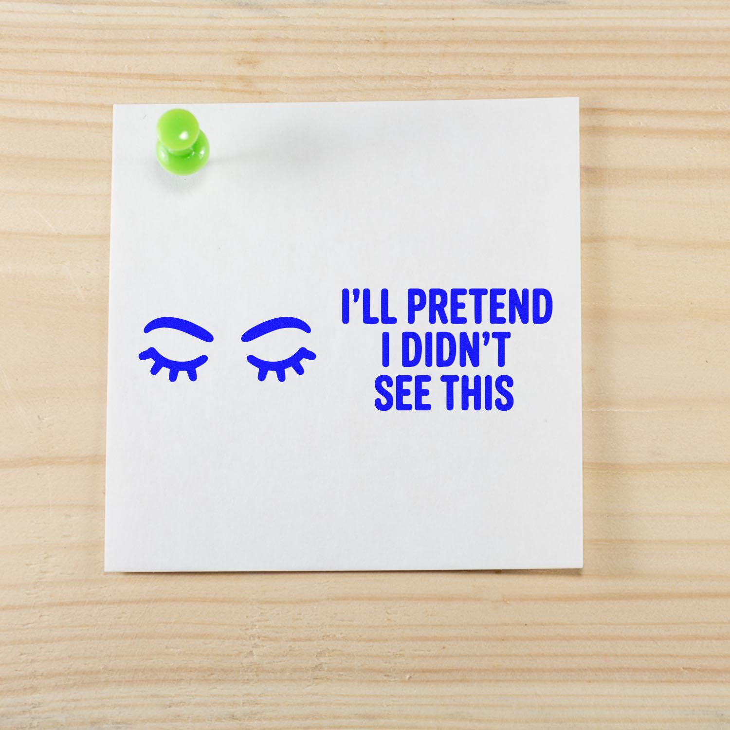 Blue rubber stamp and seal design on white card with closed eyes and ILL PRETEND I DIDNT SEE THIS, pinned with green pushpin.