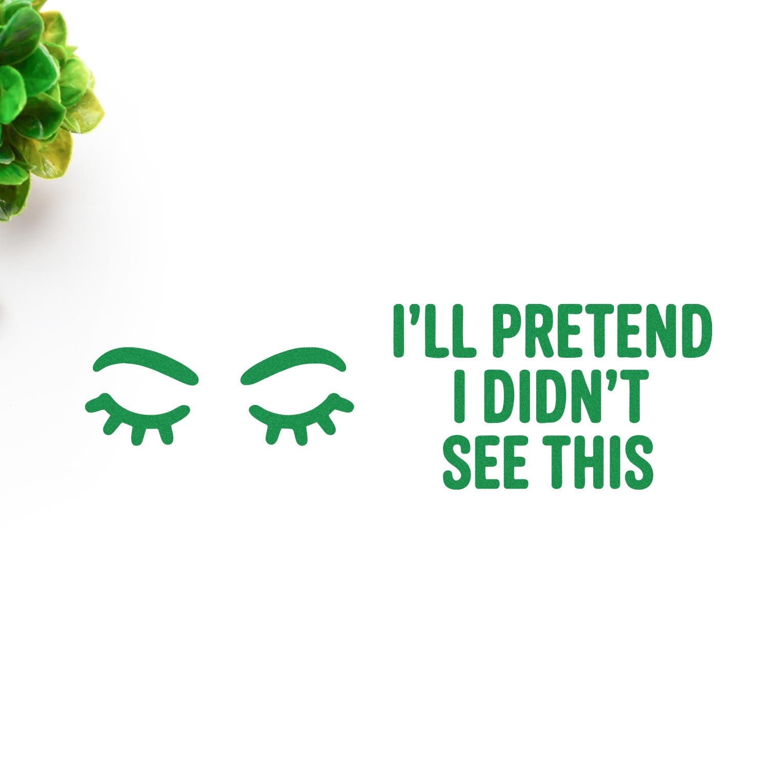 Green stamp seal with eyelash icon and Ill pretend I didnt see this text on a white background.