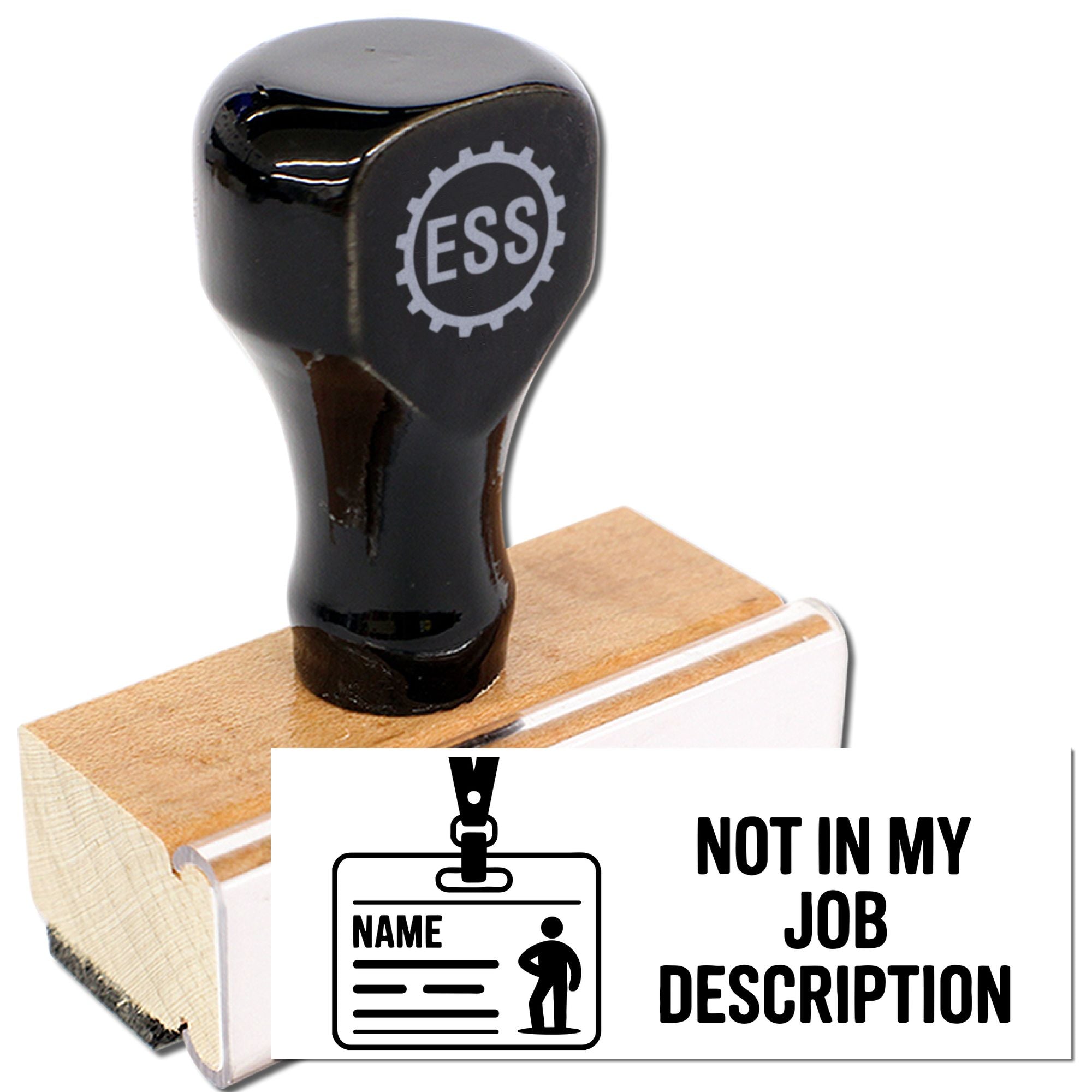 Black ESS rubber stamp on wooden block with white seal plate reading Not in My Job Description.