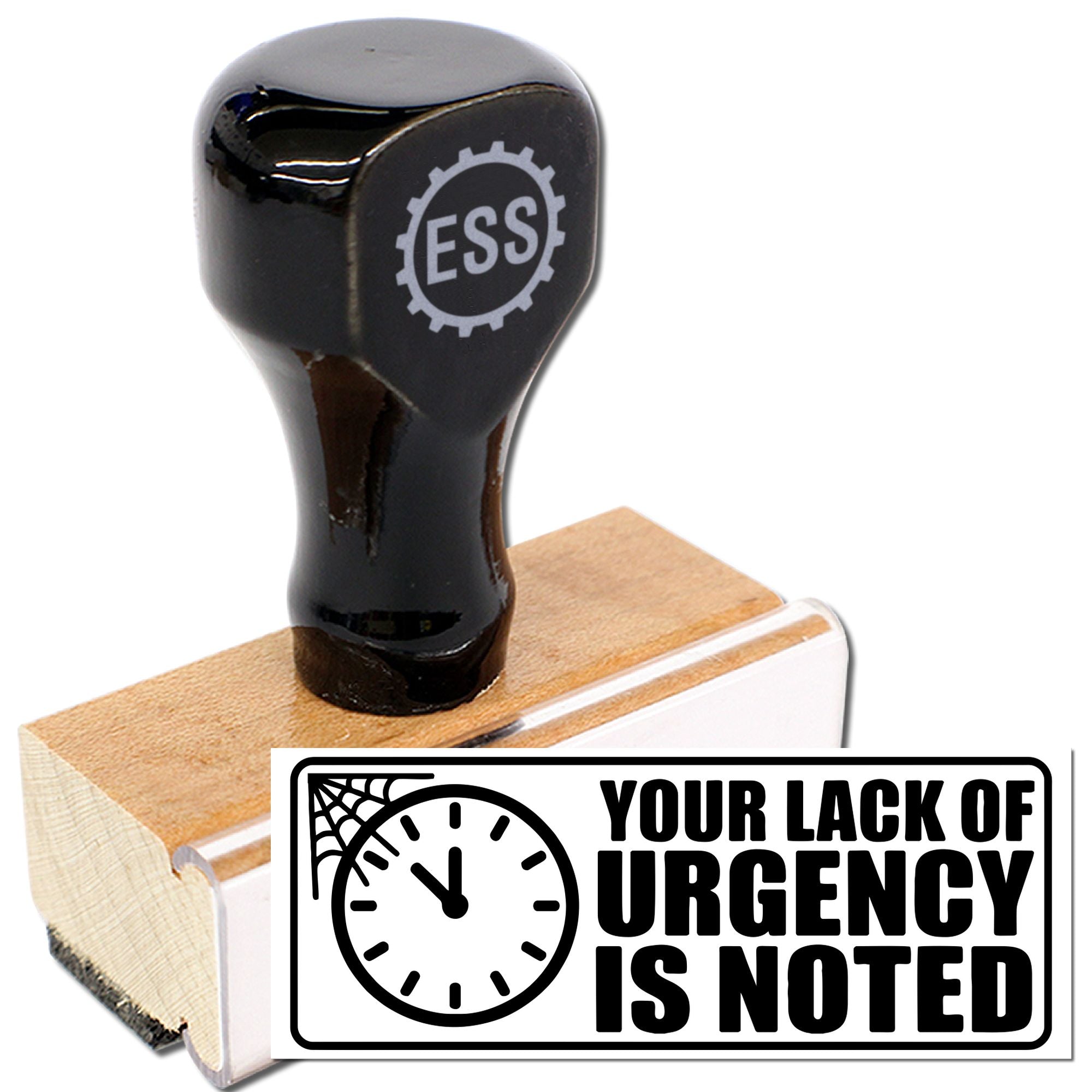 Black self-inking rubber stamp with ESS logo, wooden base, and bold Your lack of urgency is noted seal text.