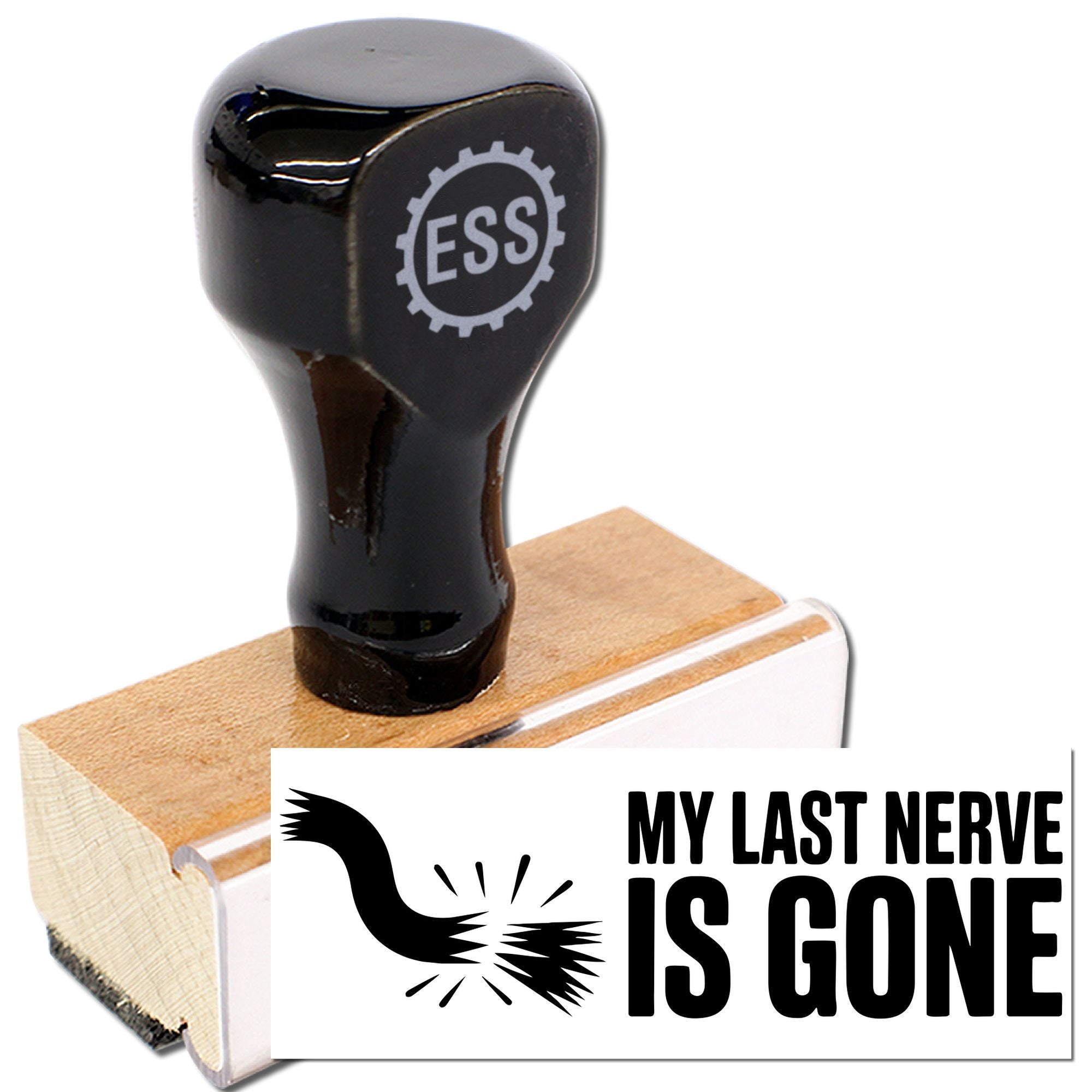 Black rubber stamp and seal on wood block with white card reading MY LAST NERVE IS GONE and a black bird graphic.