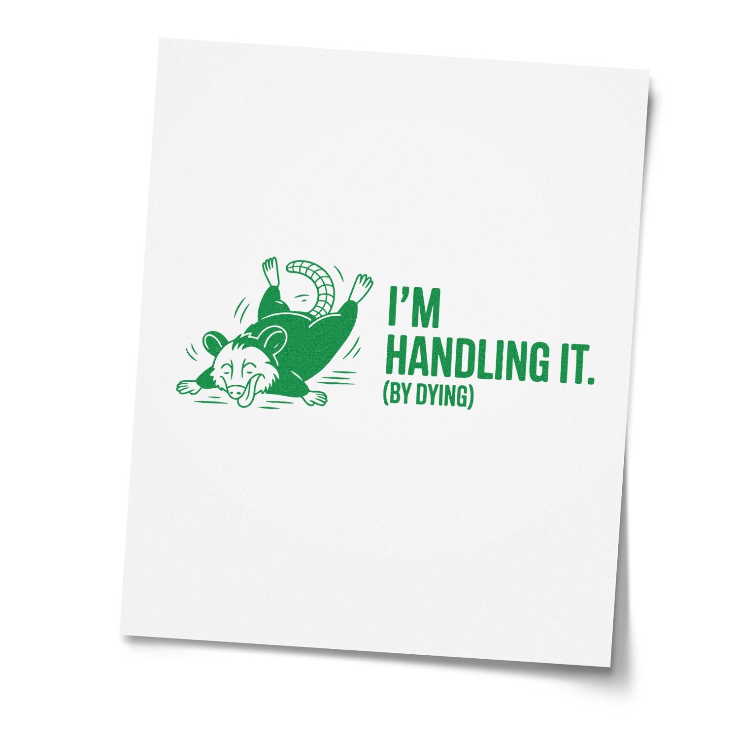 Green stamp-and-seal design with opossum and IM HANDLING IT. (BY DYING) on white paper