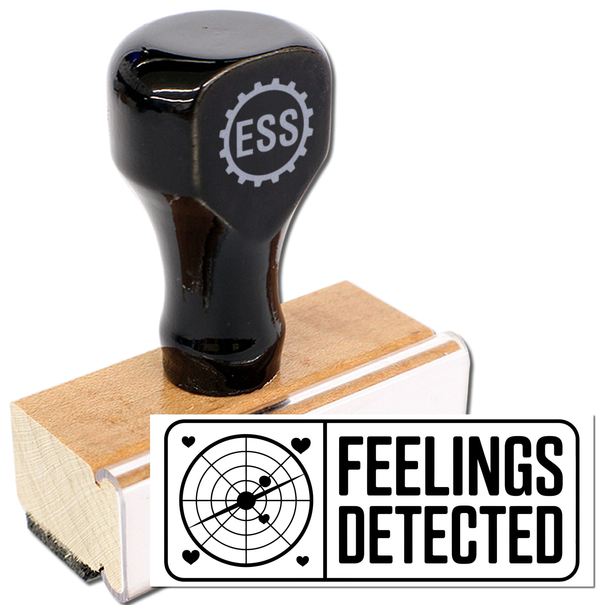Black rubber stamp on wooden base with ESS logo and FEELINGS DETECTED seal, target and hearts, on white background.
