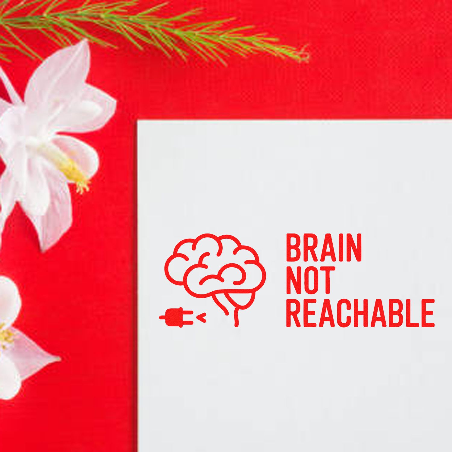 Red brain-not-reachable stamp seal on white card, with brain icon and bold red text on a bright red background with white flowers.