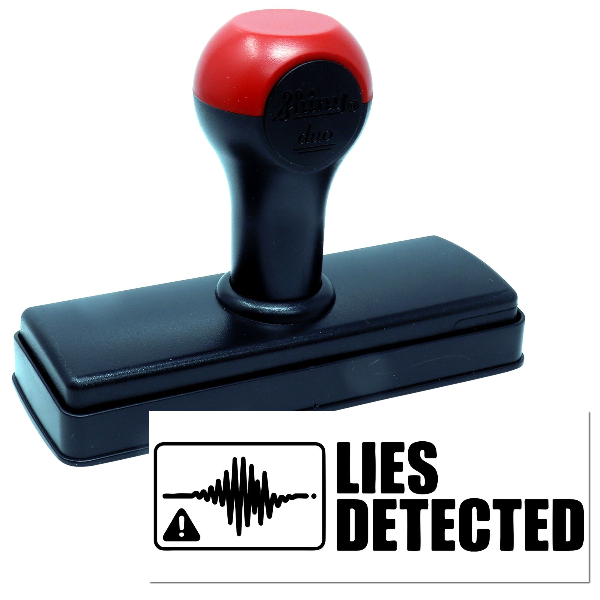Red and black self-inking stamp with rectangular base and bold "LIES DETECTED" seal graphic.