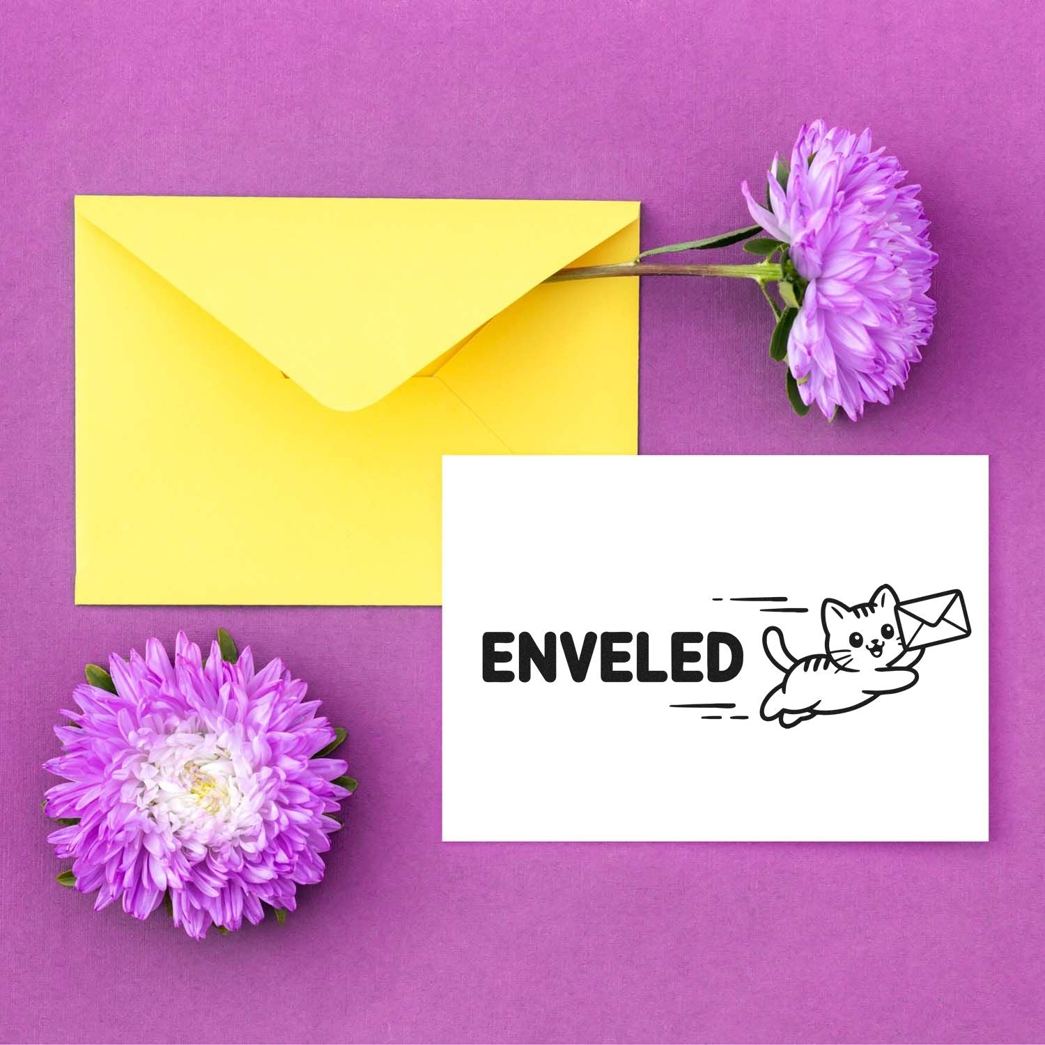 Yellow envelope and purple flowers beside a white ENVELED stamp and seal card with cat-and-envelope logo on purple background.
